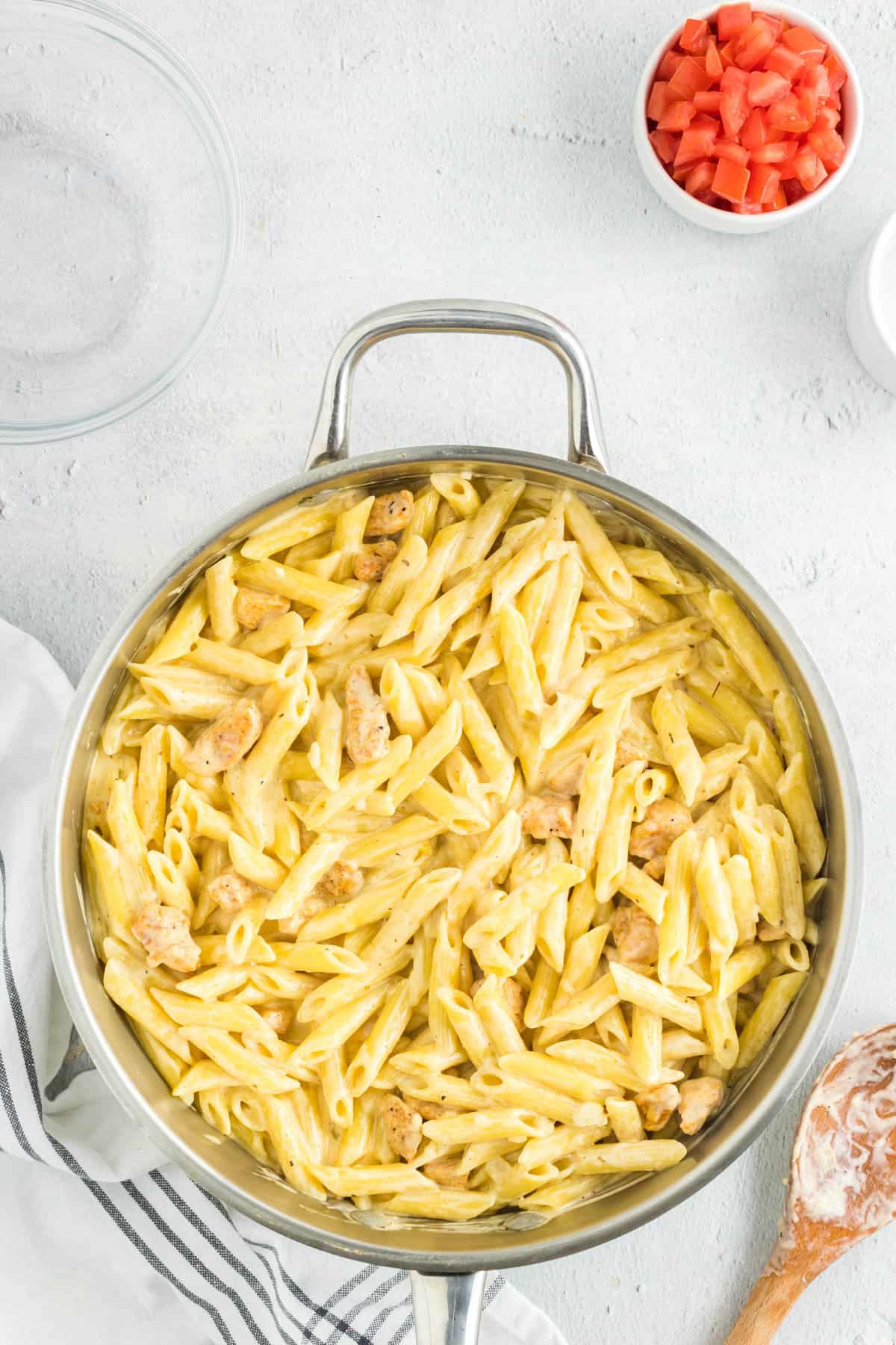 Stirring Ingredients for Cajun Chicken Pasta Recipe