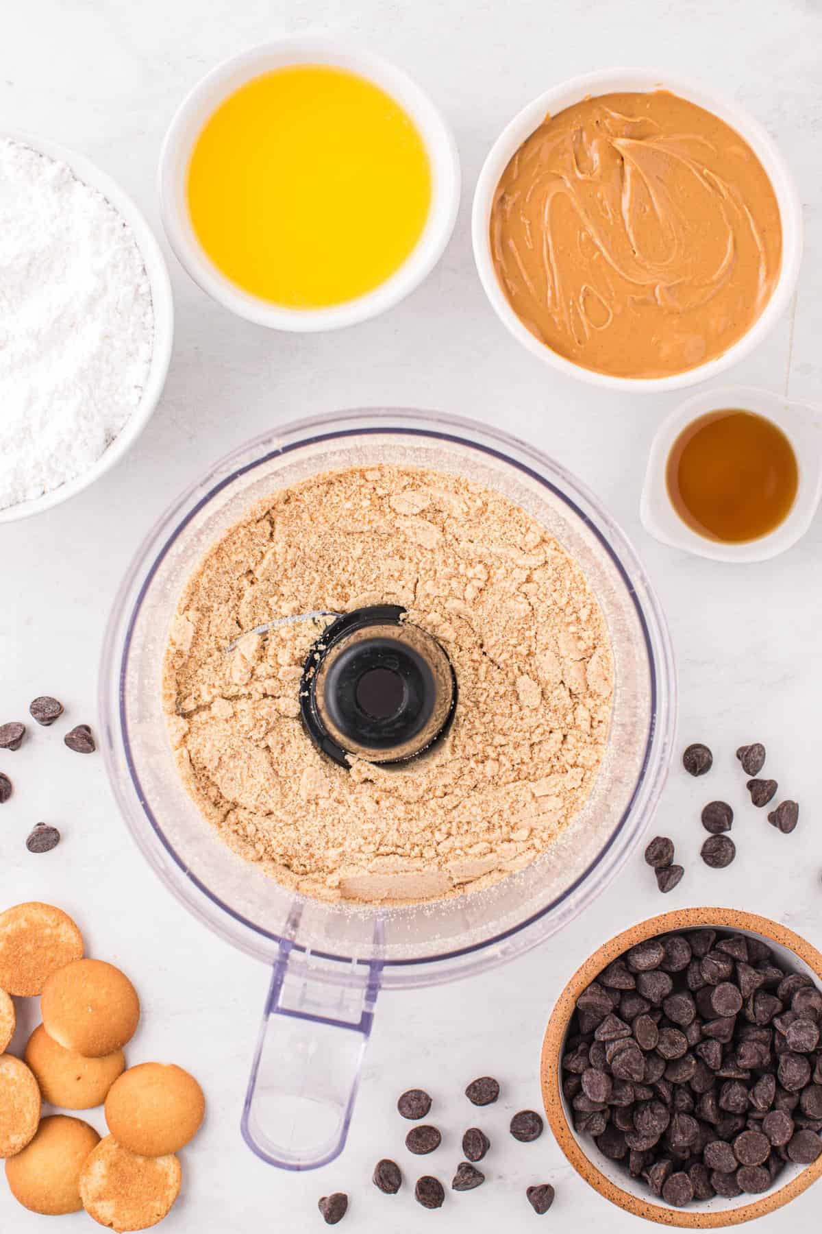 Crushed Vanilla Wafers in Food Processor for Chocolate Peanut Butter Bars Recipe