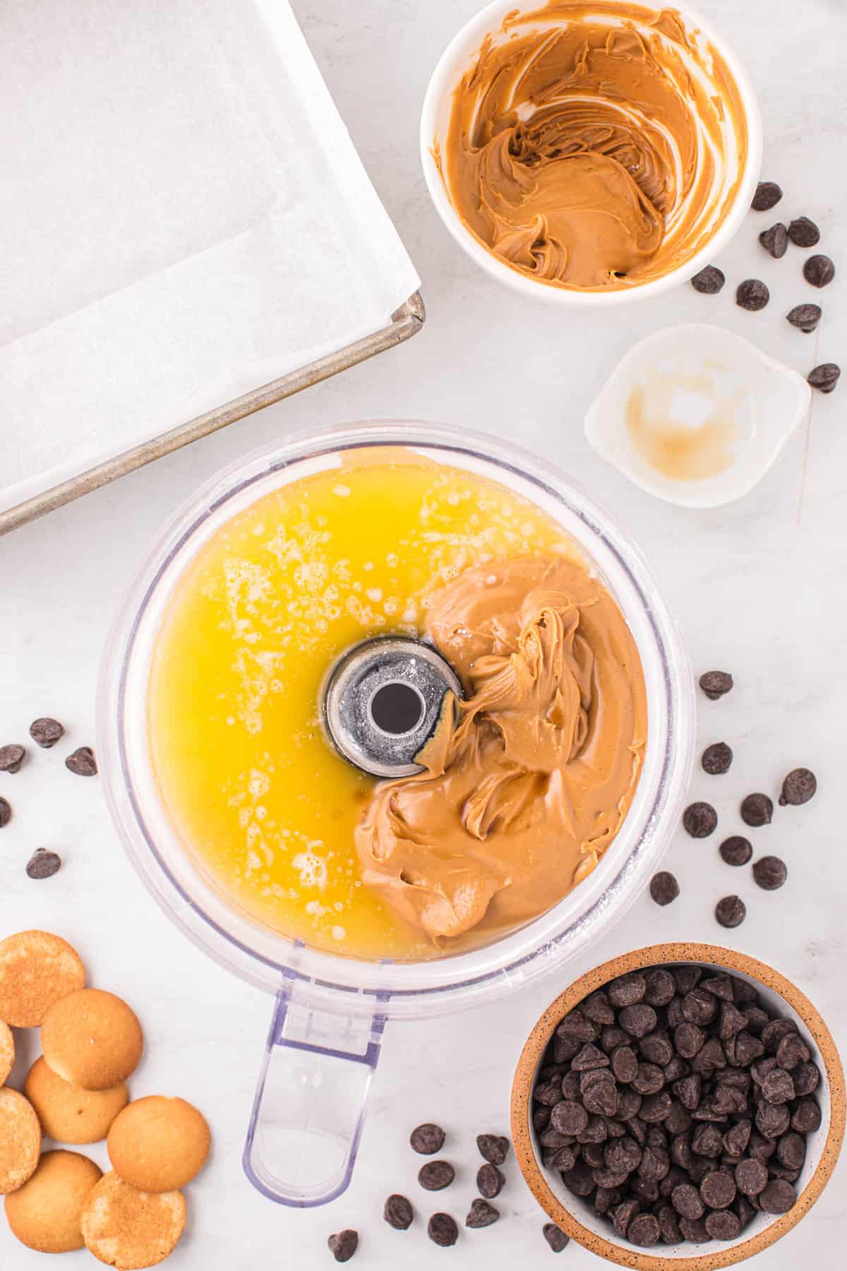 Adding Creamy Peanut Butter and Melted Butter to Mixture for Chocolate Peanut Butter Bars