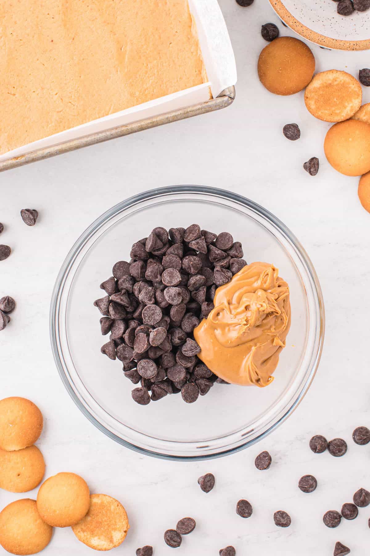 Chocolate Chips and Peanut Butter in Mixing Bowl for Chocolate Peanut Butter Bars Recipe