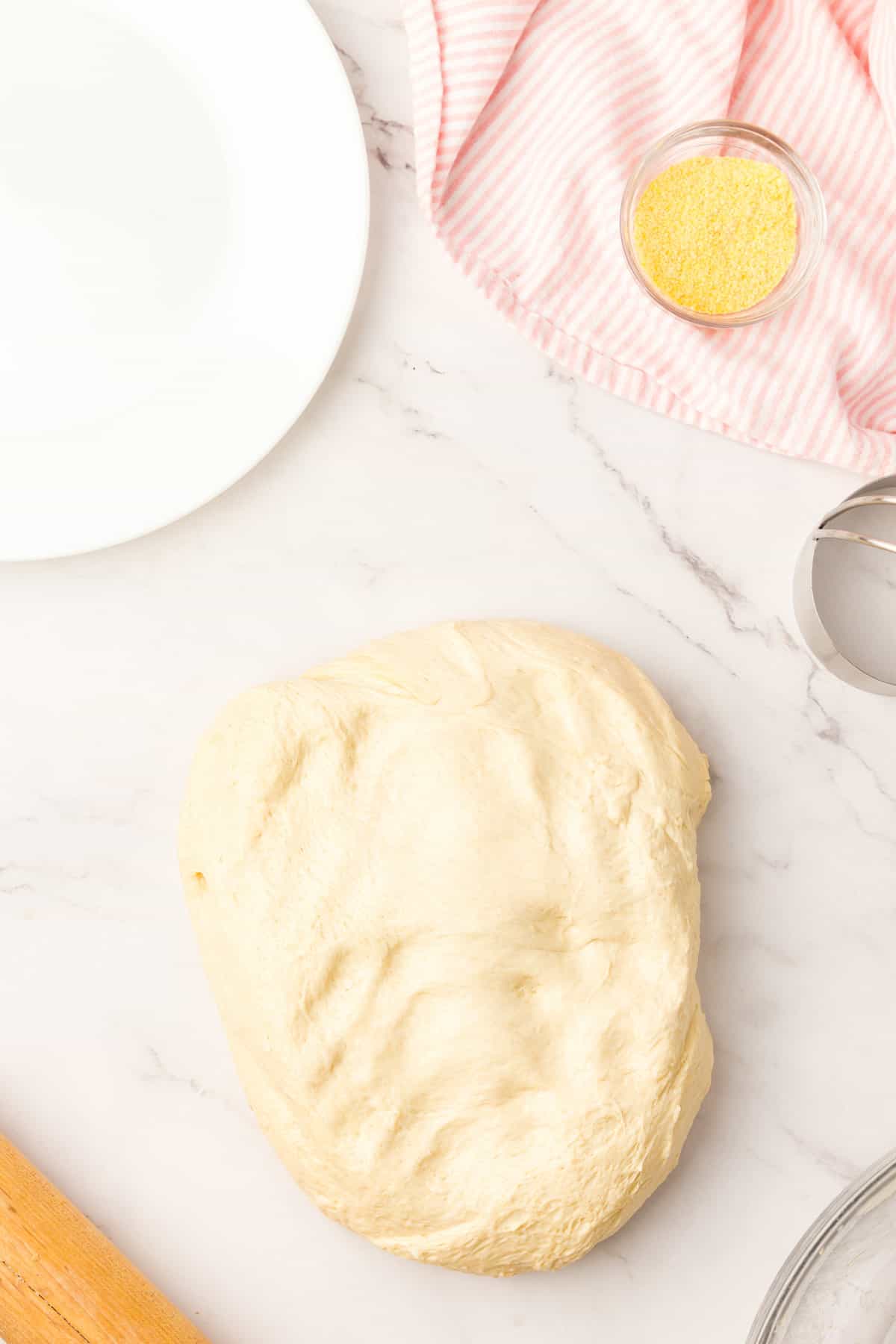Kneading Risen Dough for Homemade English Muffin Recipe