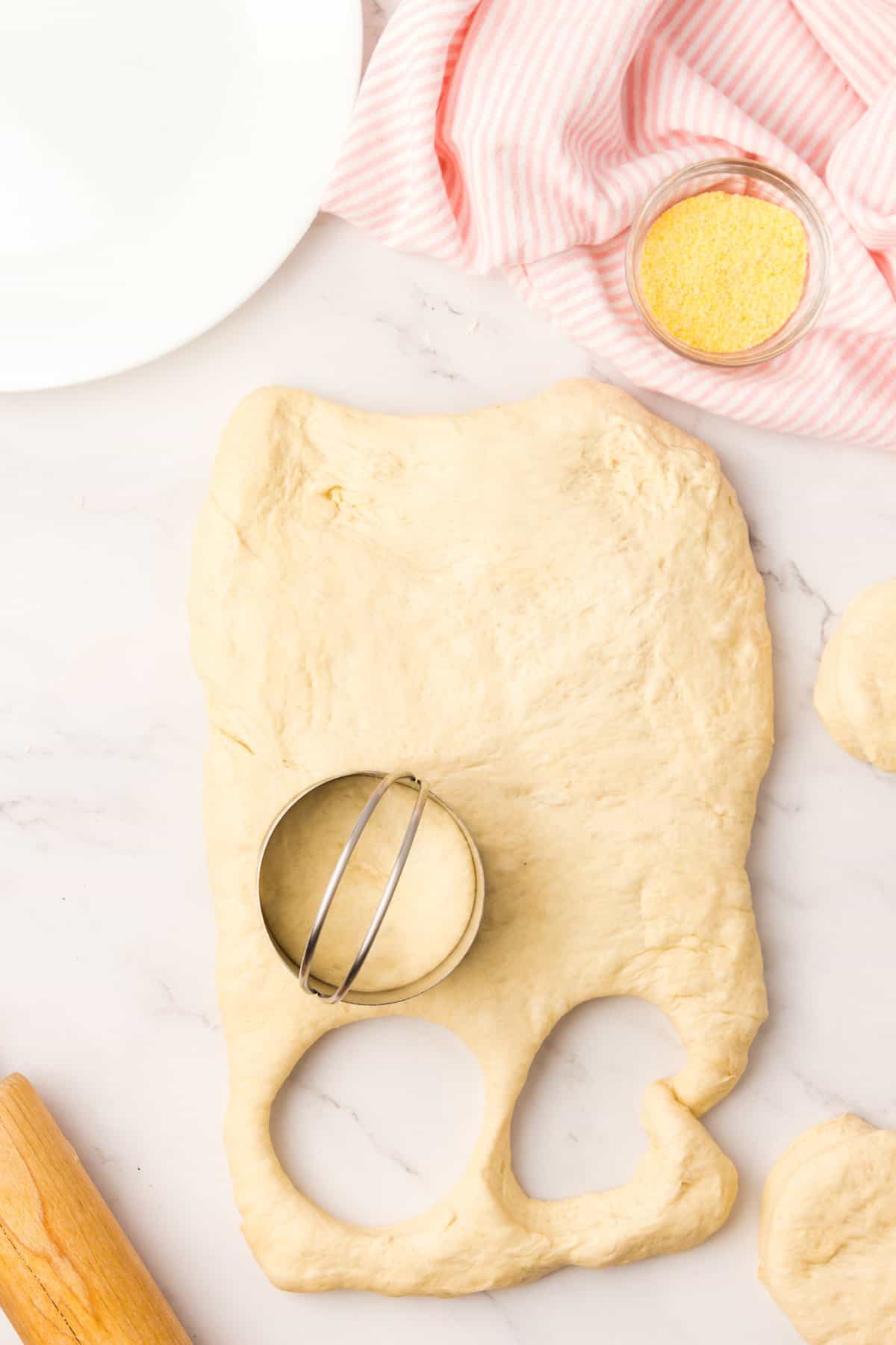 Rolling Dough Out to 1" Thick and Using a Biscuit Cutter for Homemade English Muffin Recipe