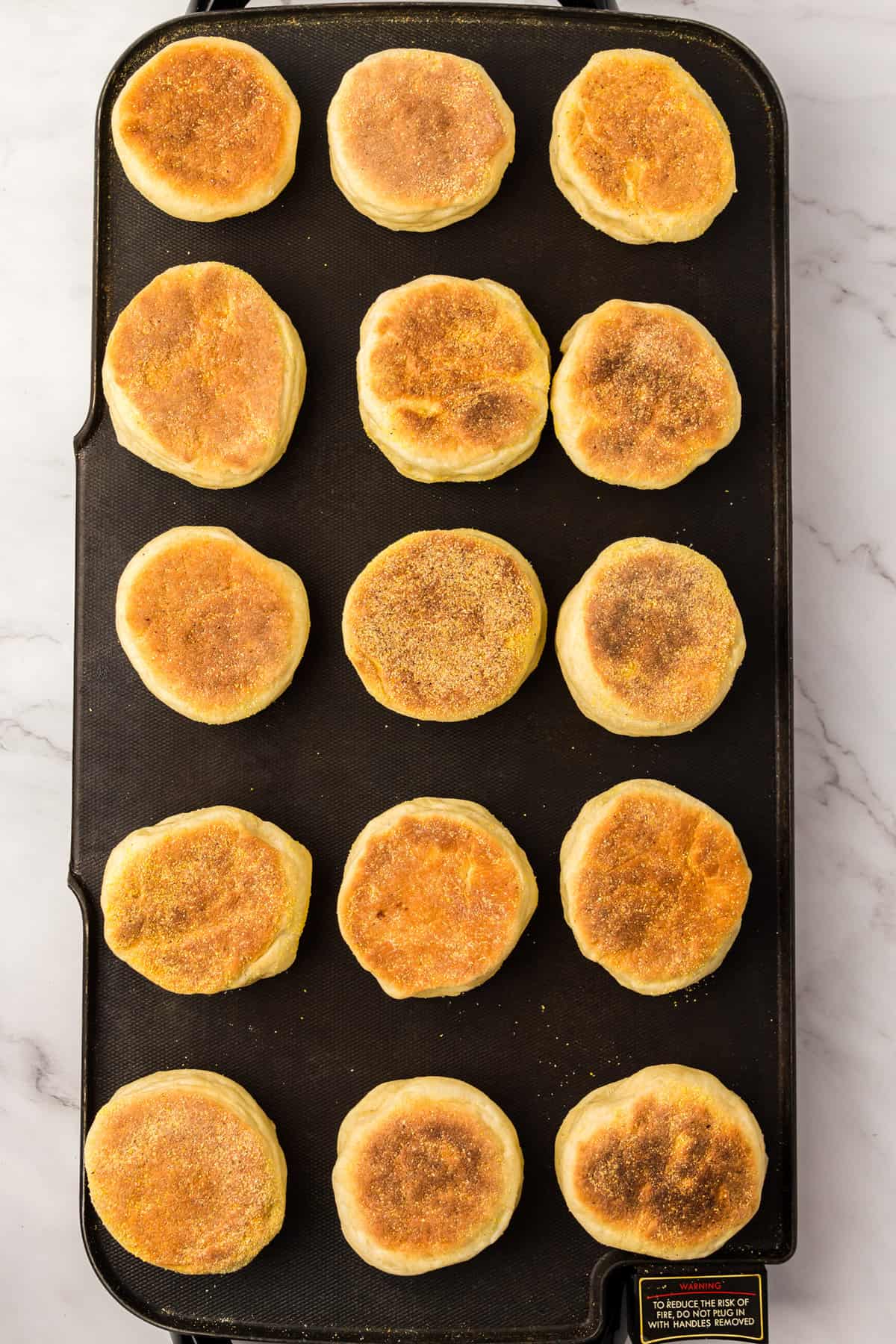 Using a Non-Stick Skillet to Brown Dough Discs for Homemade English Muffins