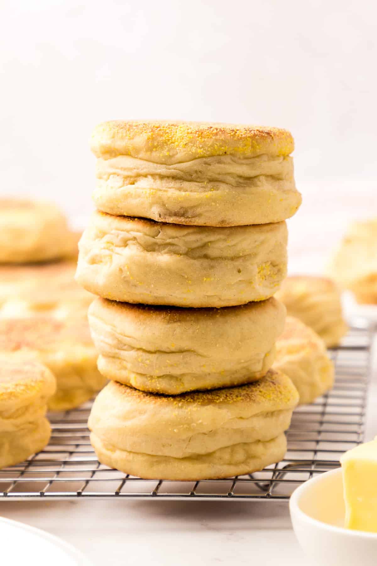 Homemade English Muffins Stacked on Cooling Rack Ready to Enjoy