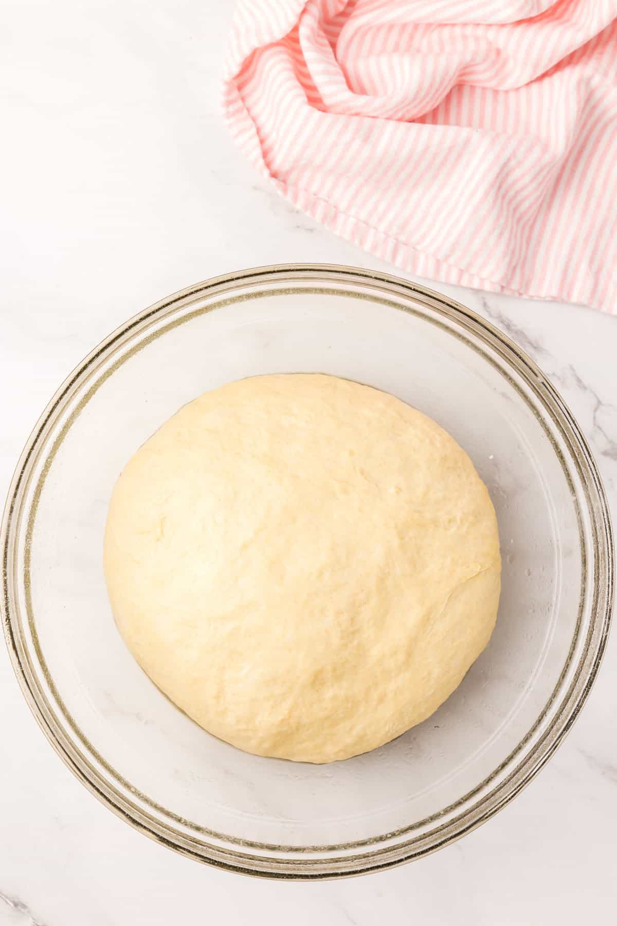 Homemade English Muffin Dough Prepared in Glass Bowl