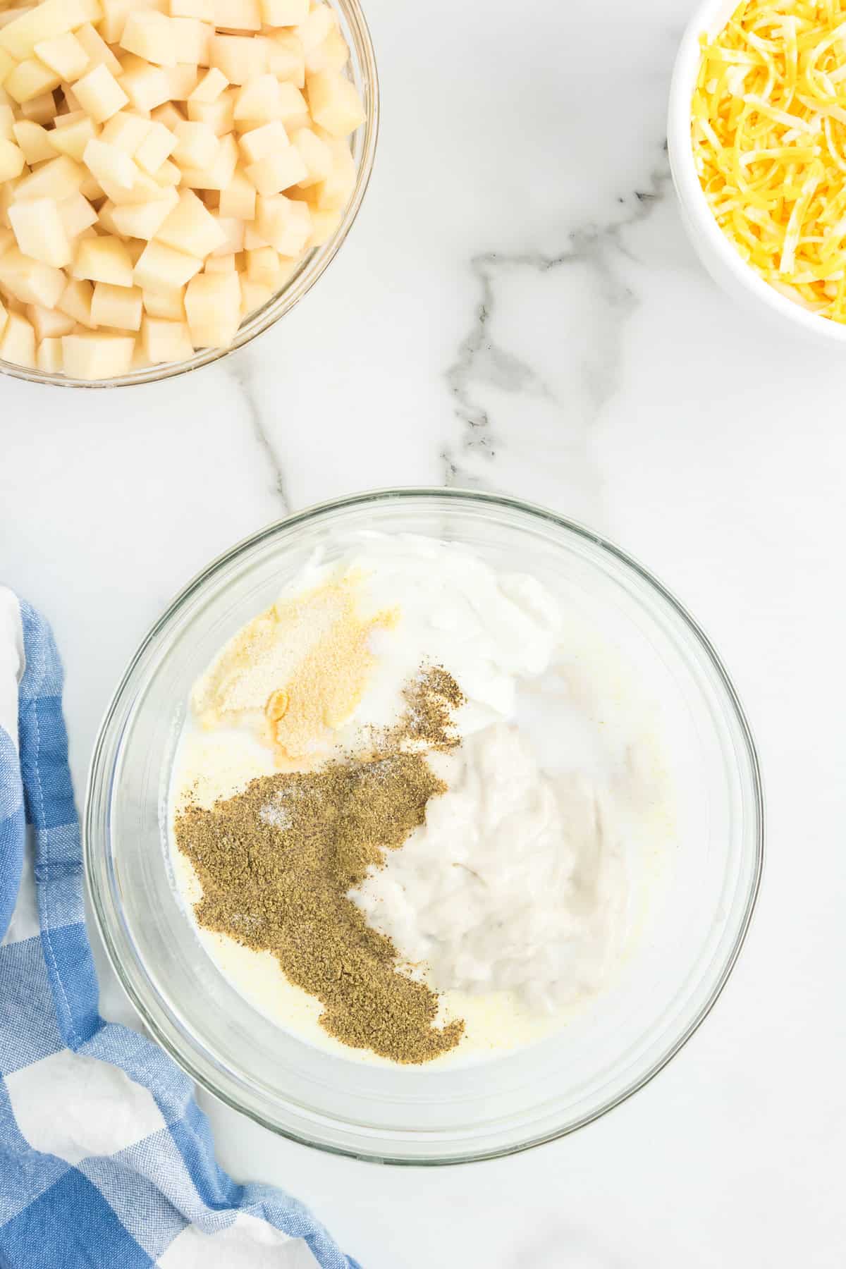 Glass bowl with cream of soup and seasonings