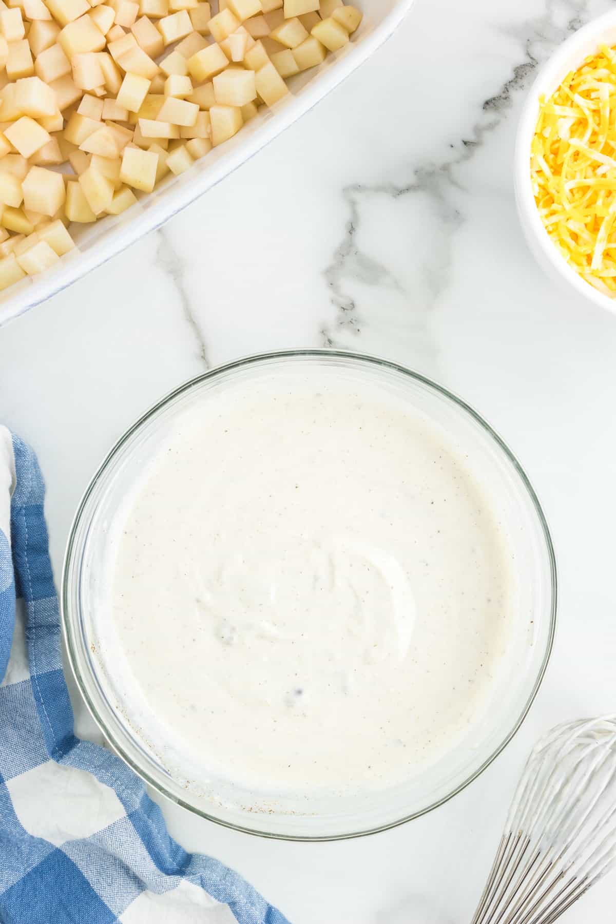 Glass bowl with cream of soup and seasonings mixed up