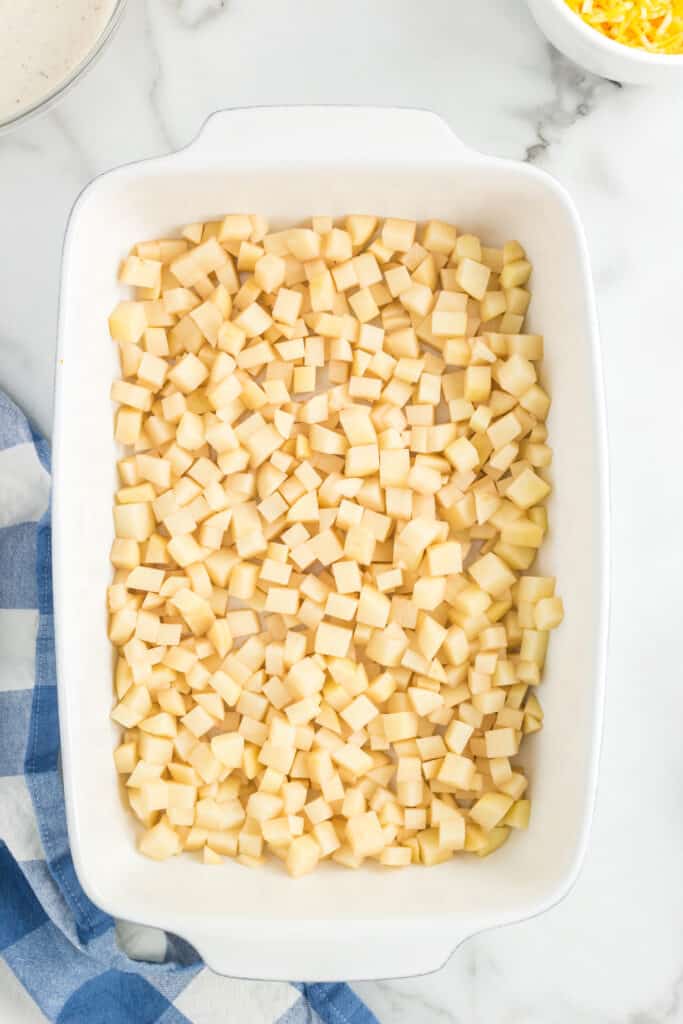 Diced potatoes in casserole dish