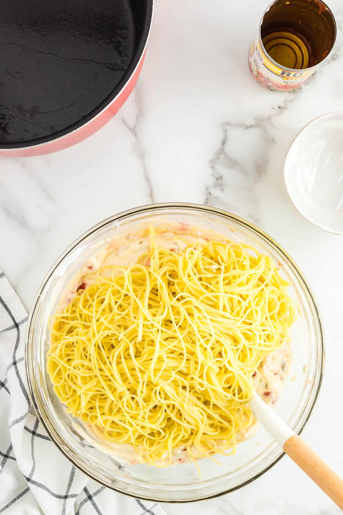 Adding Cooked Angel Hair Pasta into Mixture for Mexican Chicken Spaghetti Recipe
