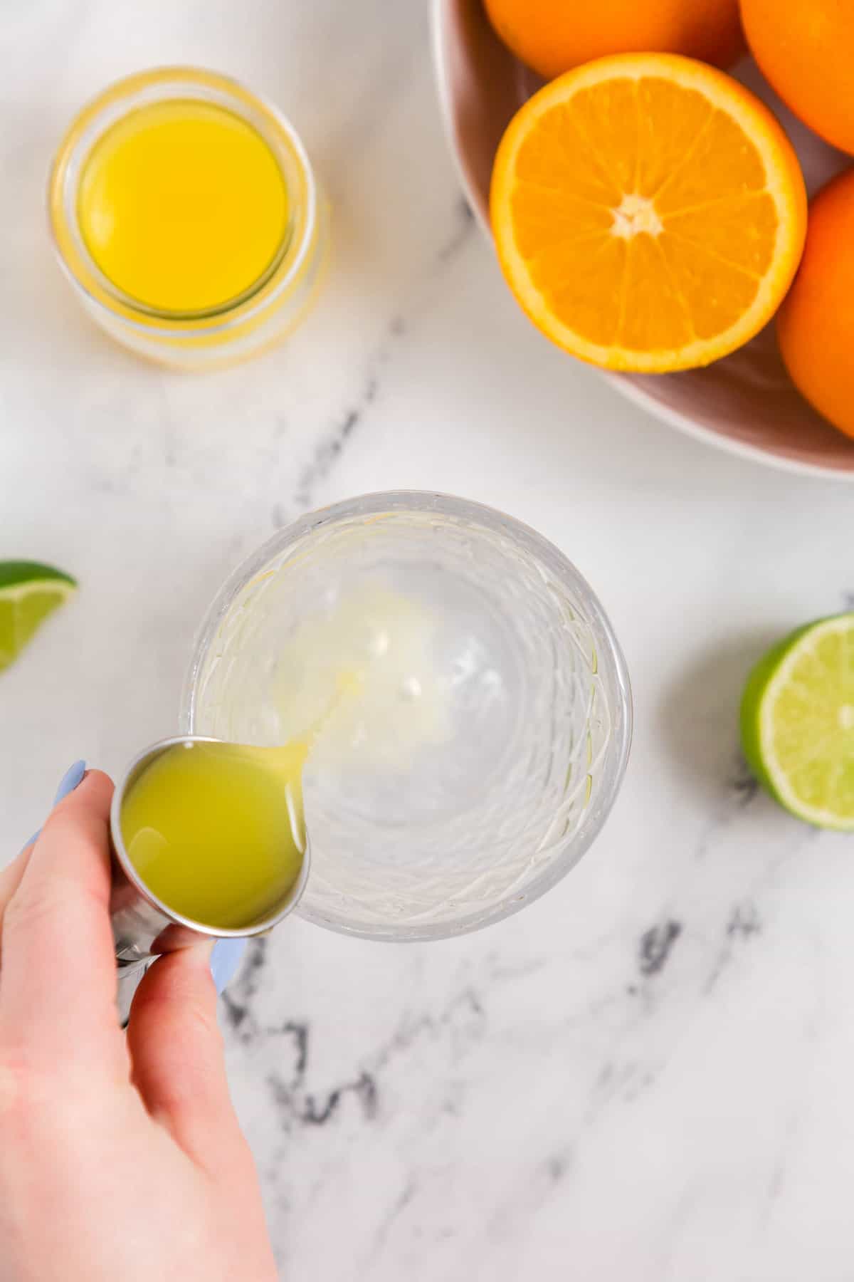 Adding Orange Juice to Tequila for Skinny Margarita Recipe