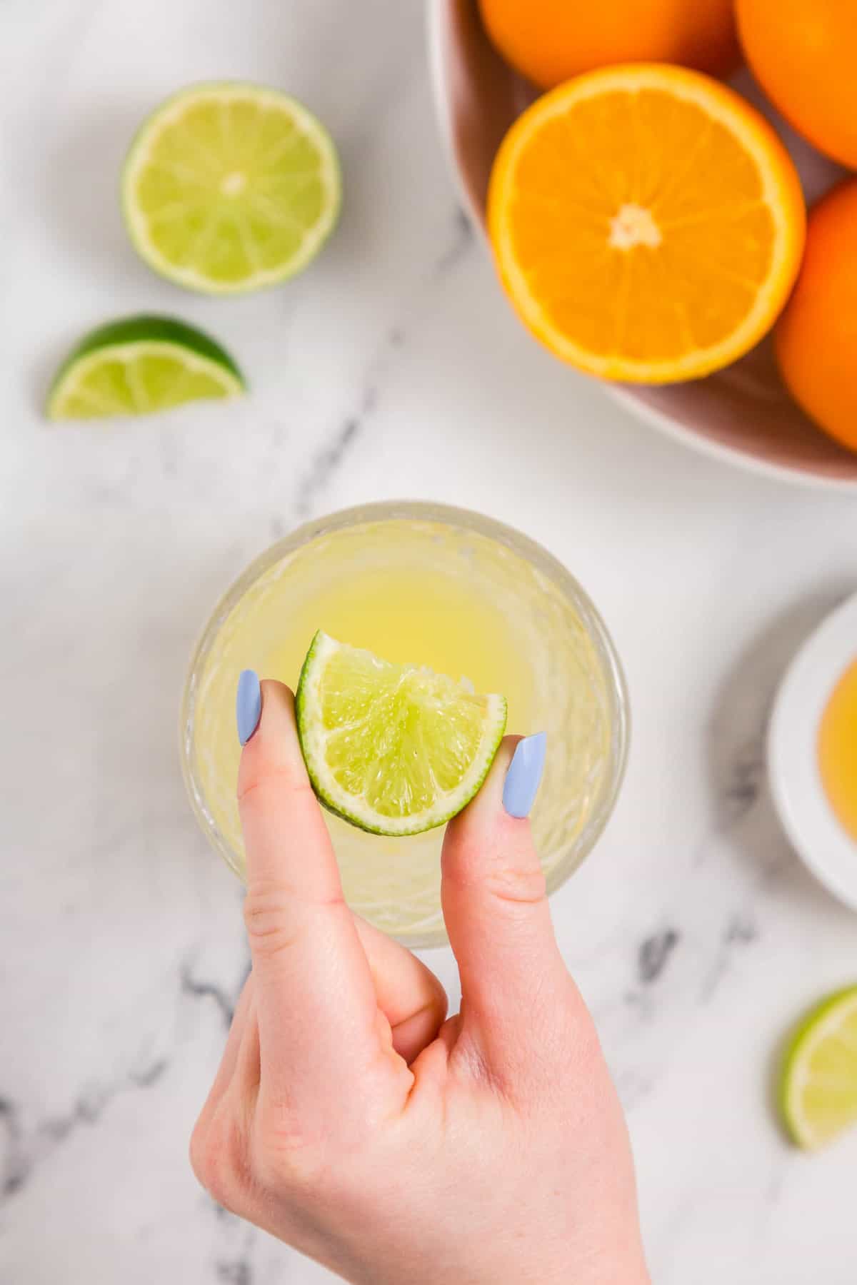 Adding Fresh Squeezed Lime Juice to Skinny Margarita