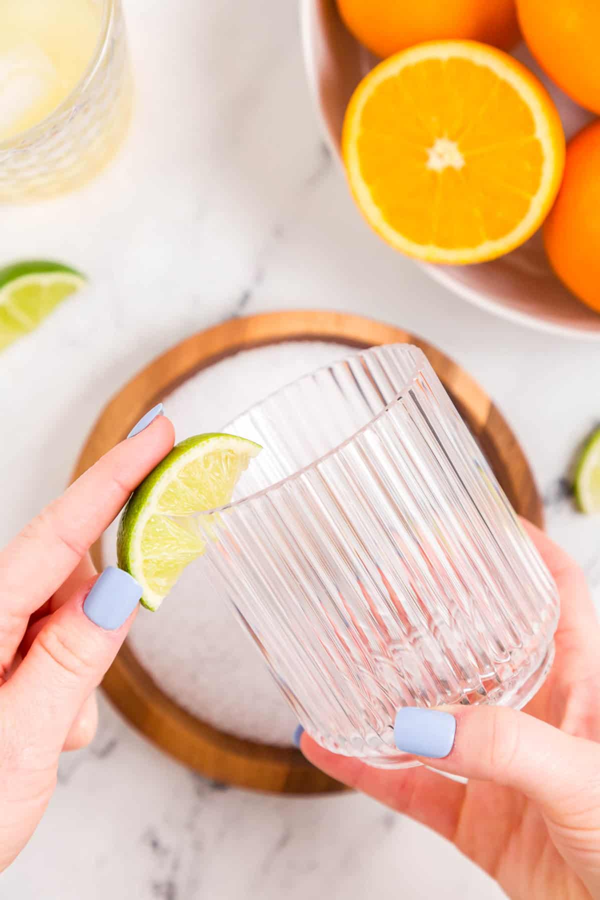 Running Lime Wedge Around Drink Glass for Skinny Margarita