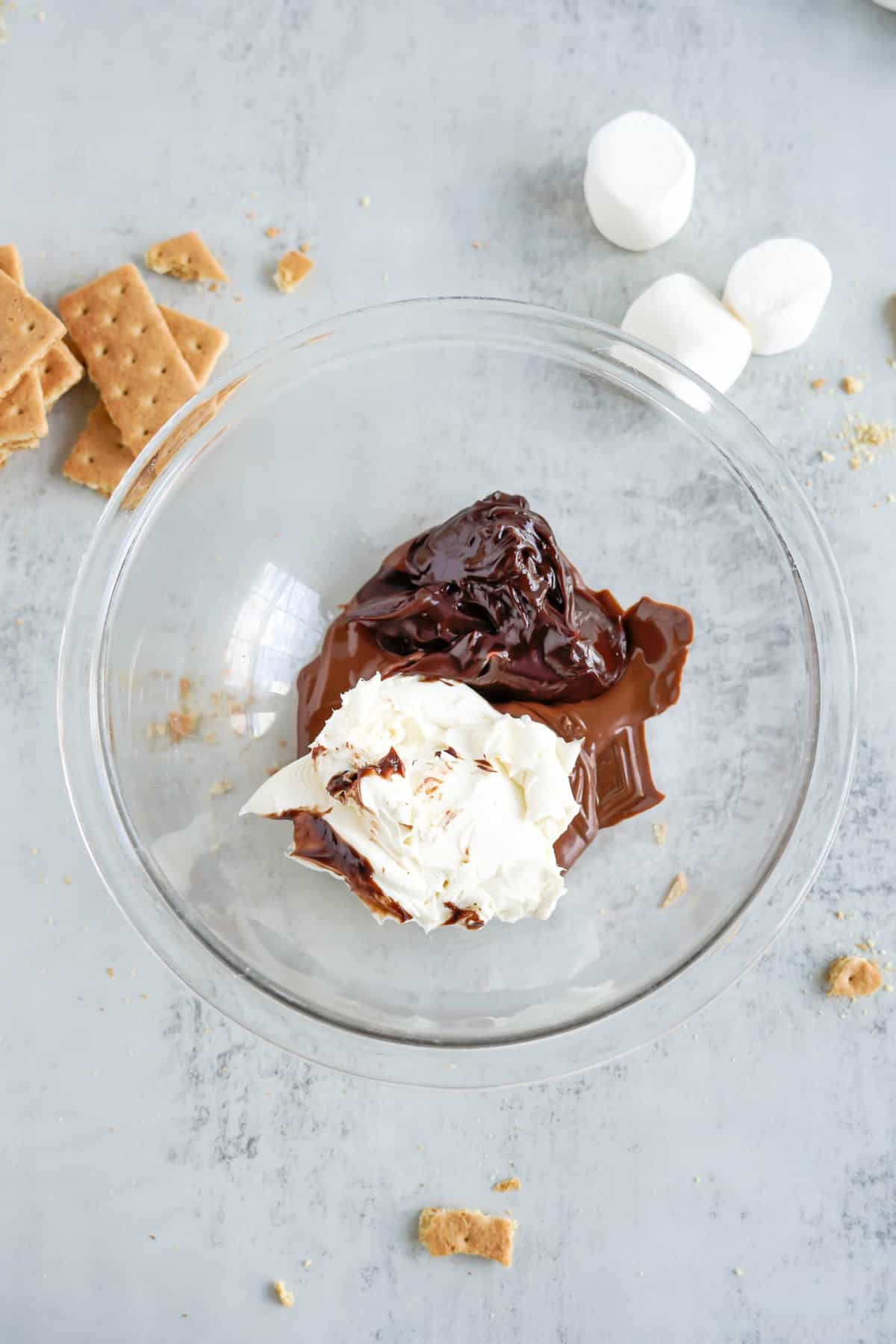 Adding Cream Cheese & Fudge to Melted Chocolate for S'more Dip in Glass Bowl