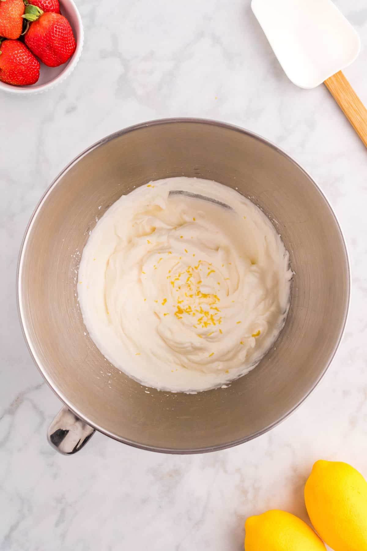 Preparing Lemon Whipped Topping for Strawberry Lemon Cake