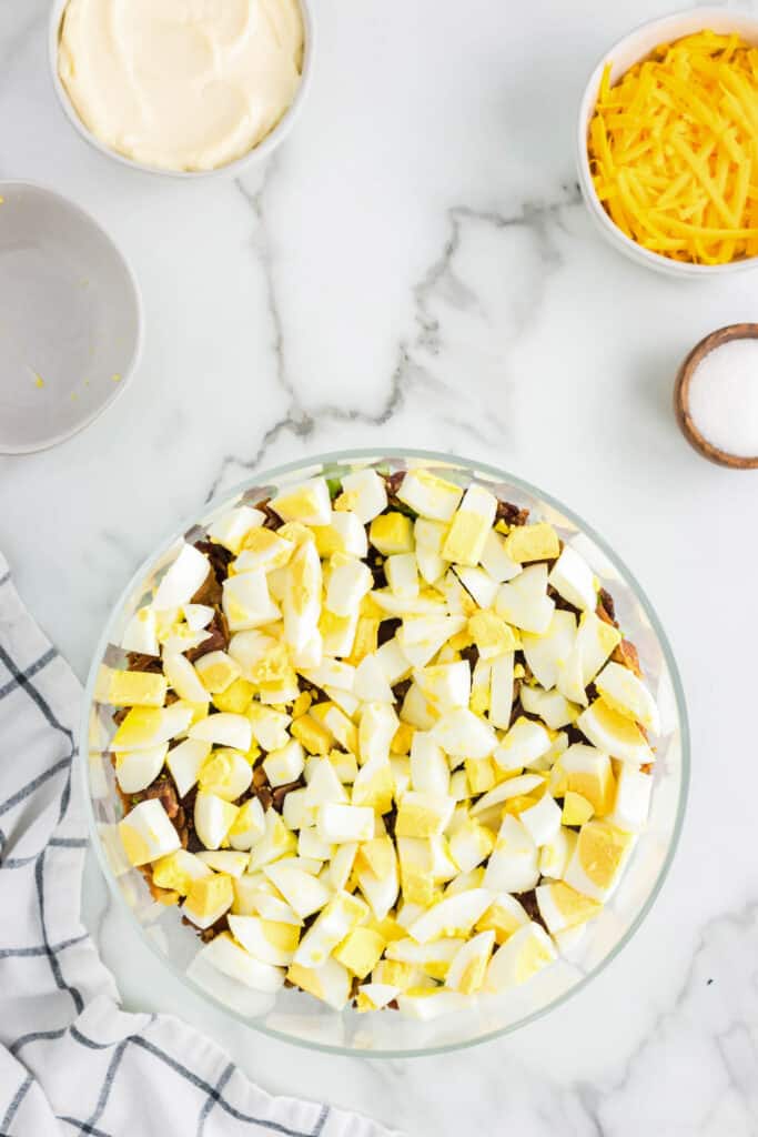 Hard Boiled Eggs Layer in 7 Layer Salad