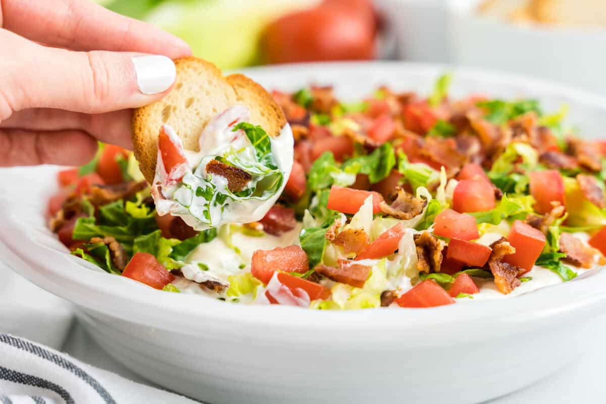 BLT Dip Recipe in Serving Bowl with Cracker for Dipping