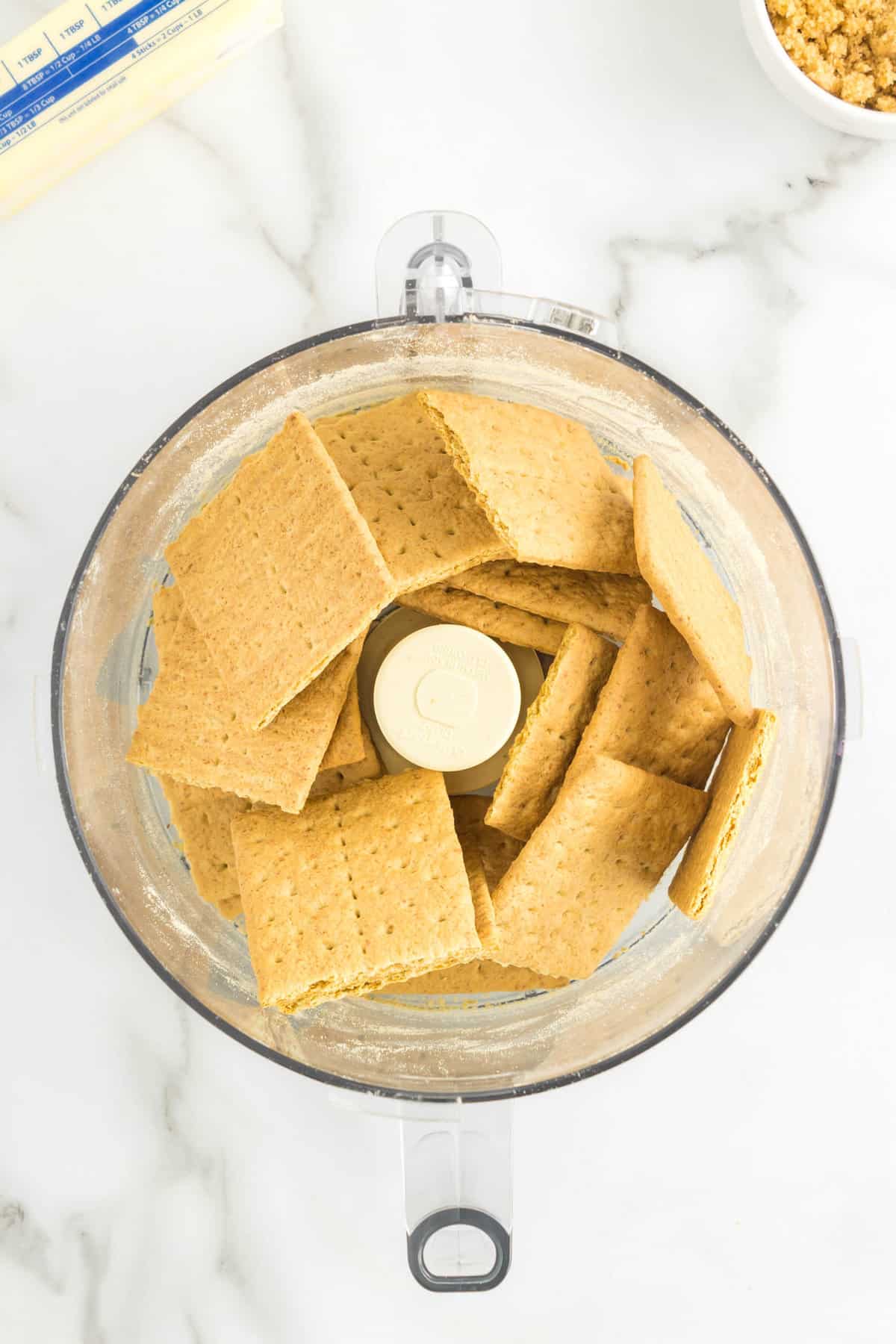 Crushing Graham Crackers in Food Processor for Graham Cracker Crust Recipe