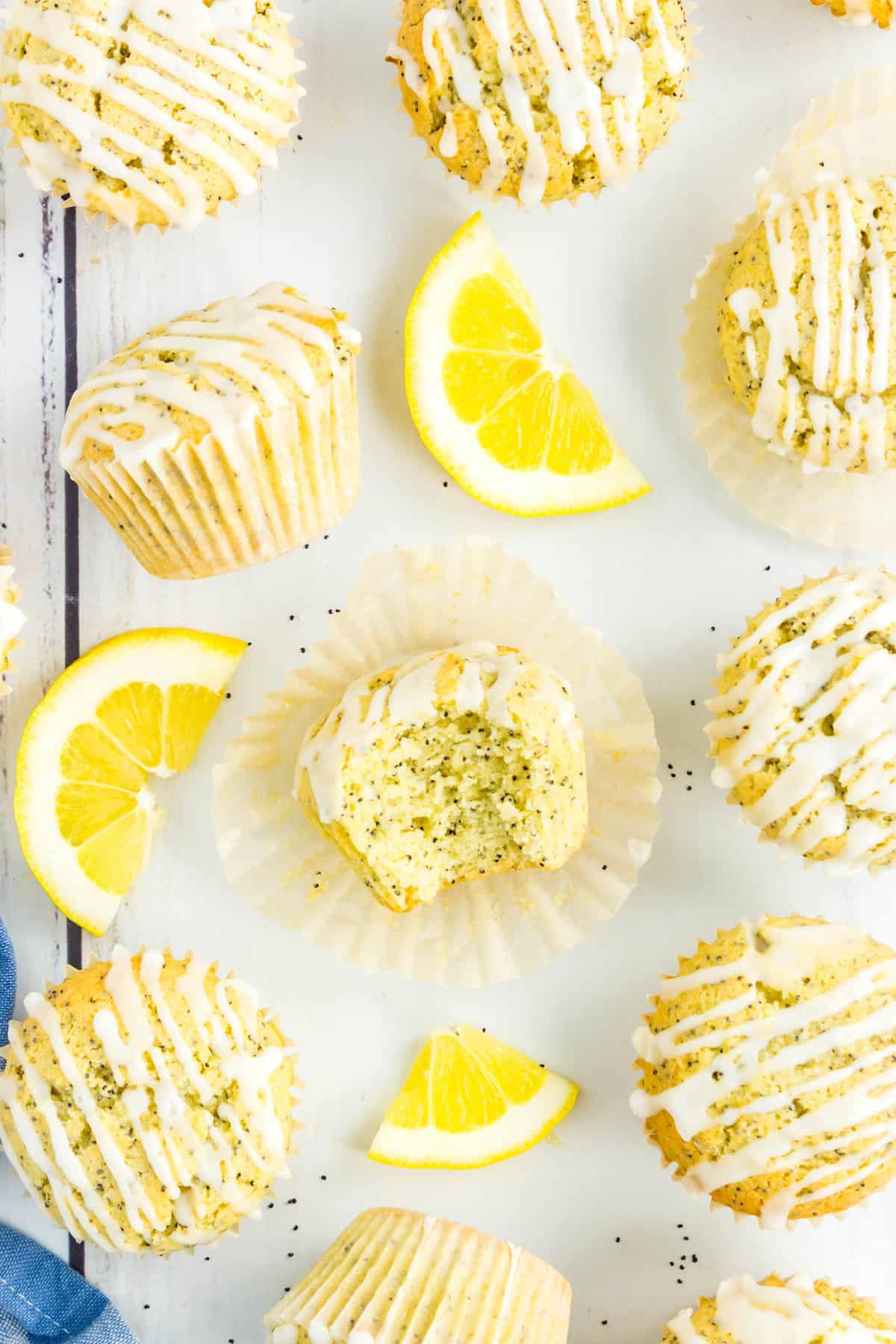 The first bite from the sweet and tangy Lemon Poppy Seed Muffins