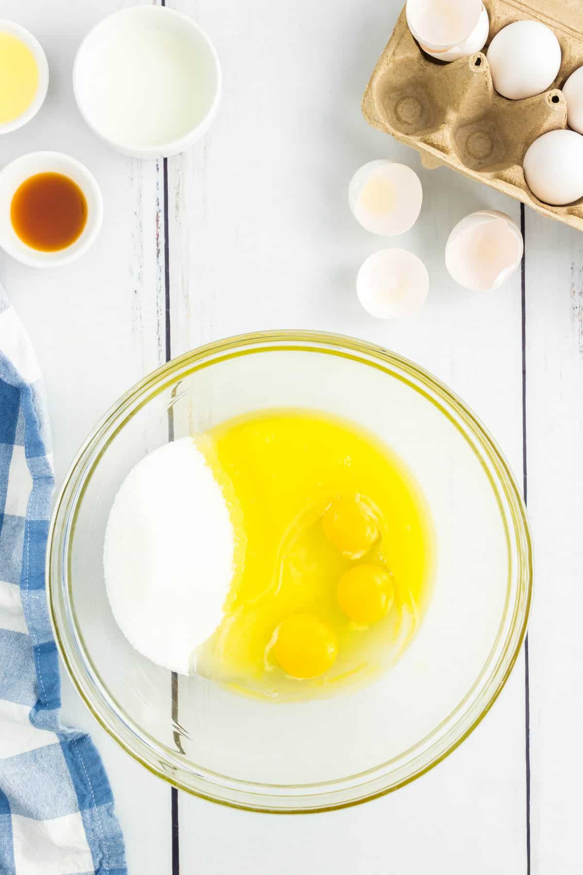 Creaming Together Wet Ingredients in Bowl for Lemon Poppy Seed Muffins Recipe