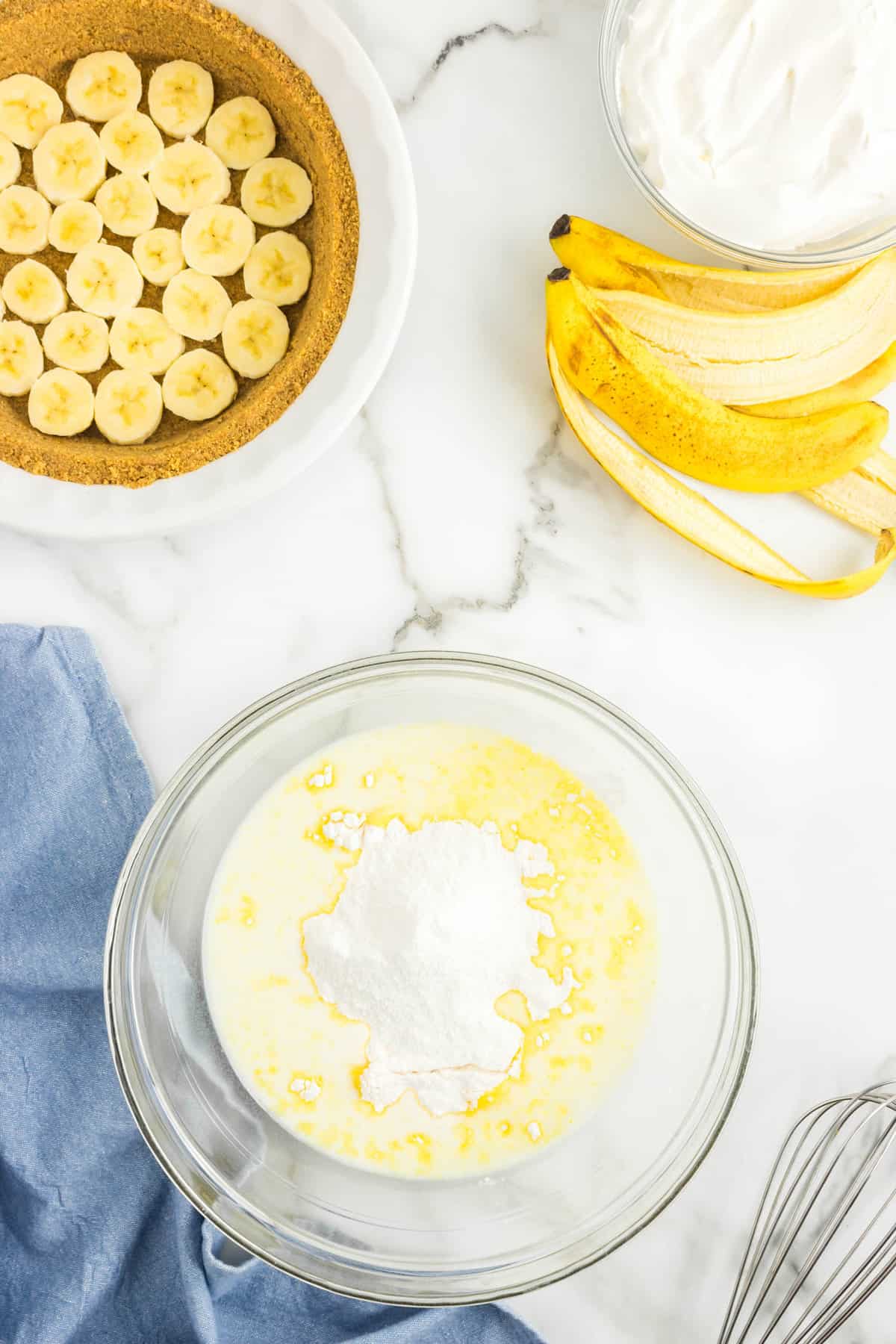 Combining Pie Filling in Mixing Bowl for No Bake Banana Cream Pie