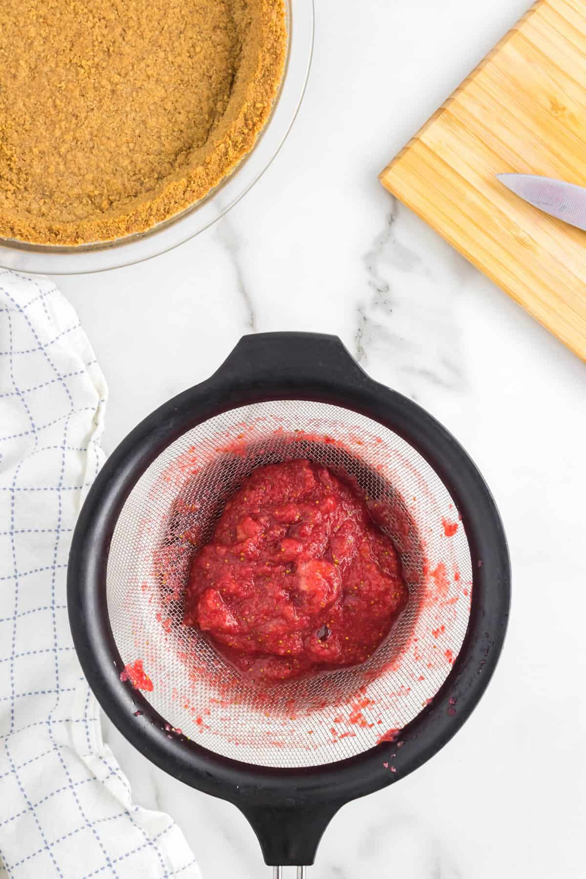 Strained Strawberries for No Bake Strawberry Cheesecake Recipe