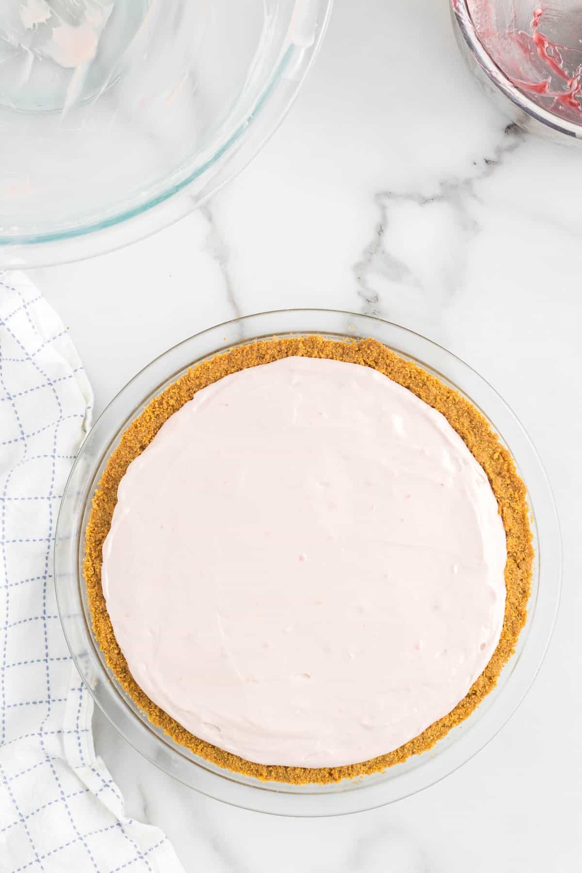 No Bake Strawberry Cheesecake Recipe Ready to Set in Crust