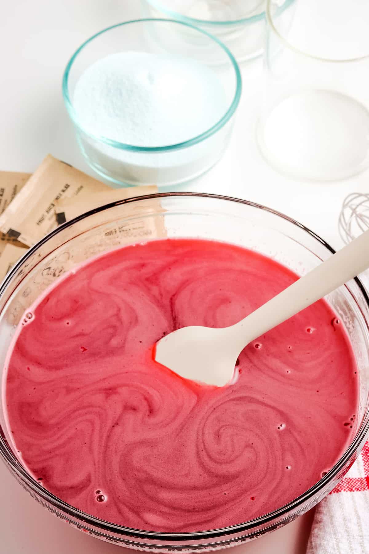 Pour in the boiling water and whisk until the jello is disolved