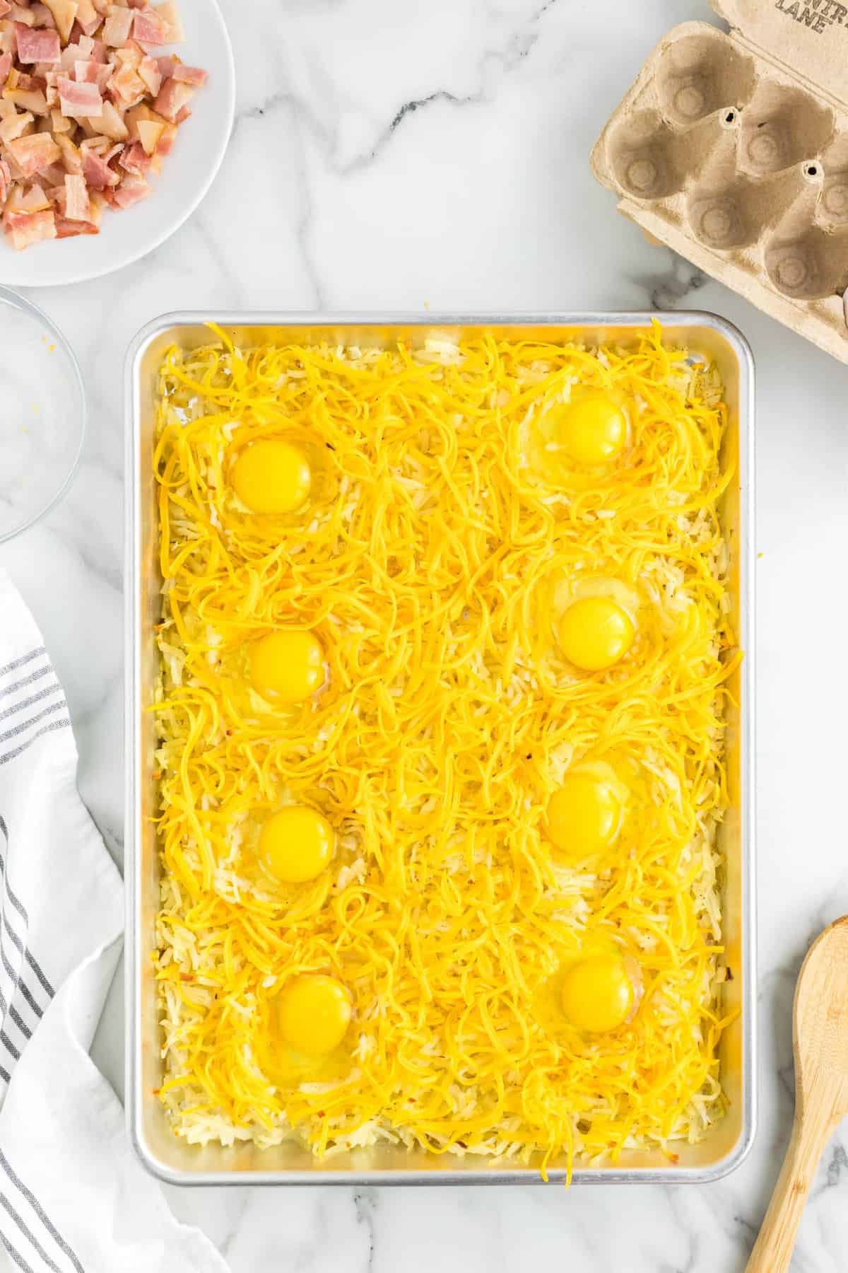 Cracked Eggs in Holes for Sheet Pan Breakfast Recipe