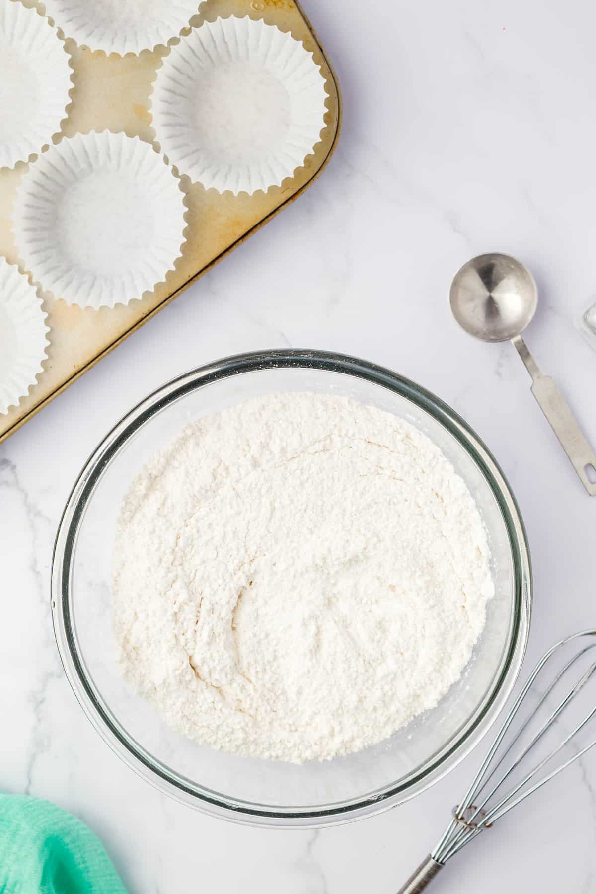 Mixing Dry Ingredients in Bowl for Strawberry Muffins Recipe