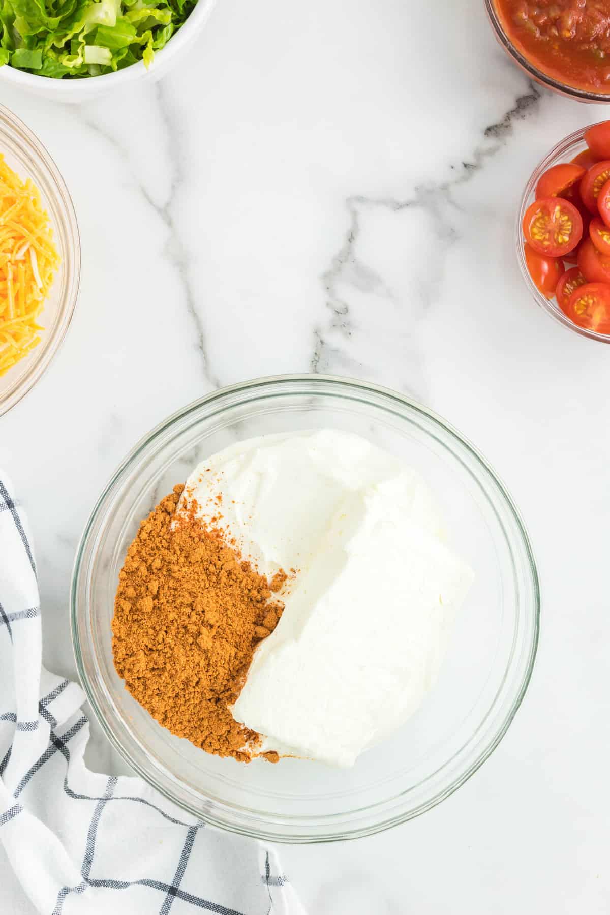 Easy Taco Dip Ingredients in Bowl Ready for Mixing