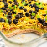 7 Layer Dip Recipe in serving dish showing the layers