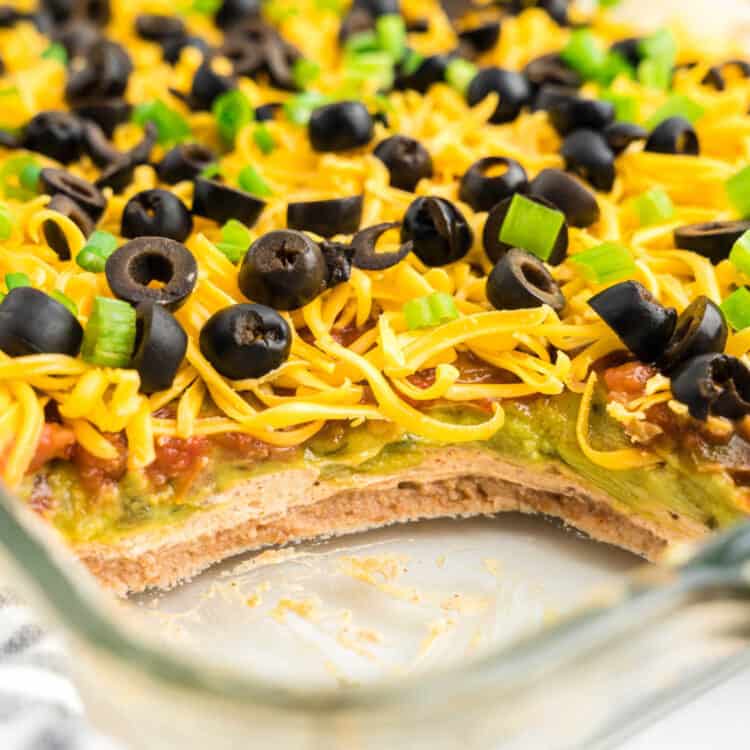 7 Layer Dip Recipe in serving dish showing the layers