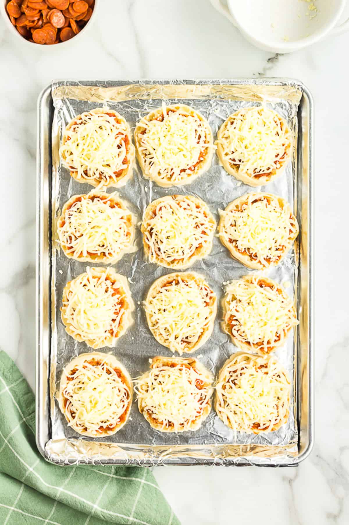 Add Motzarella Cheese to the English Muffins