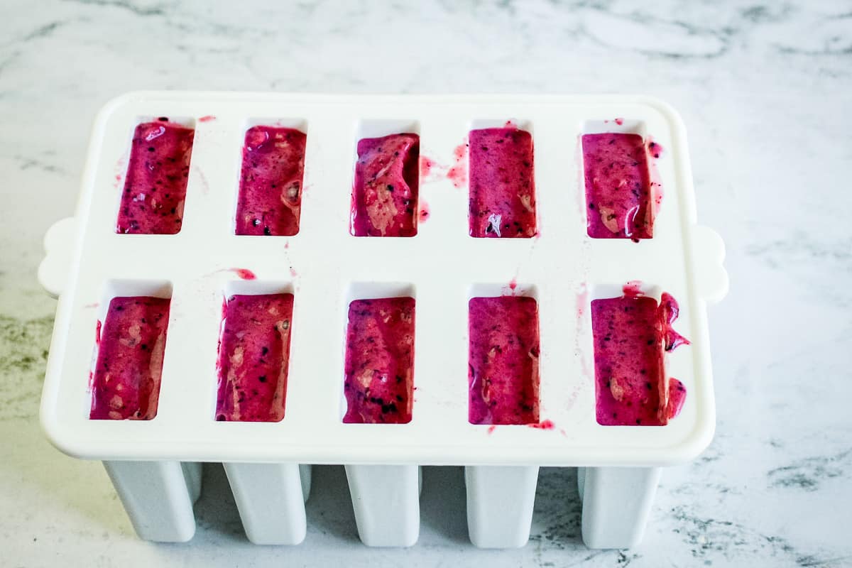 Put Berry Mixture into the popsicle molds and freeze overnight.