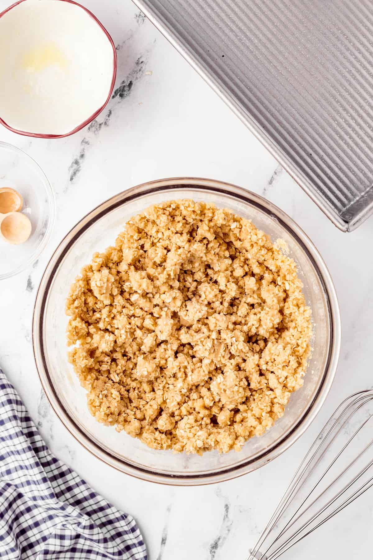 Combined ingredients in bowl for Caramel Oatmeal Bars crust