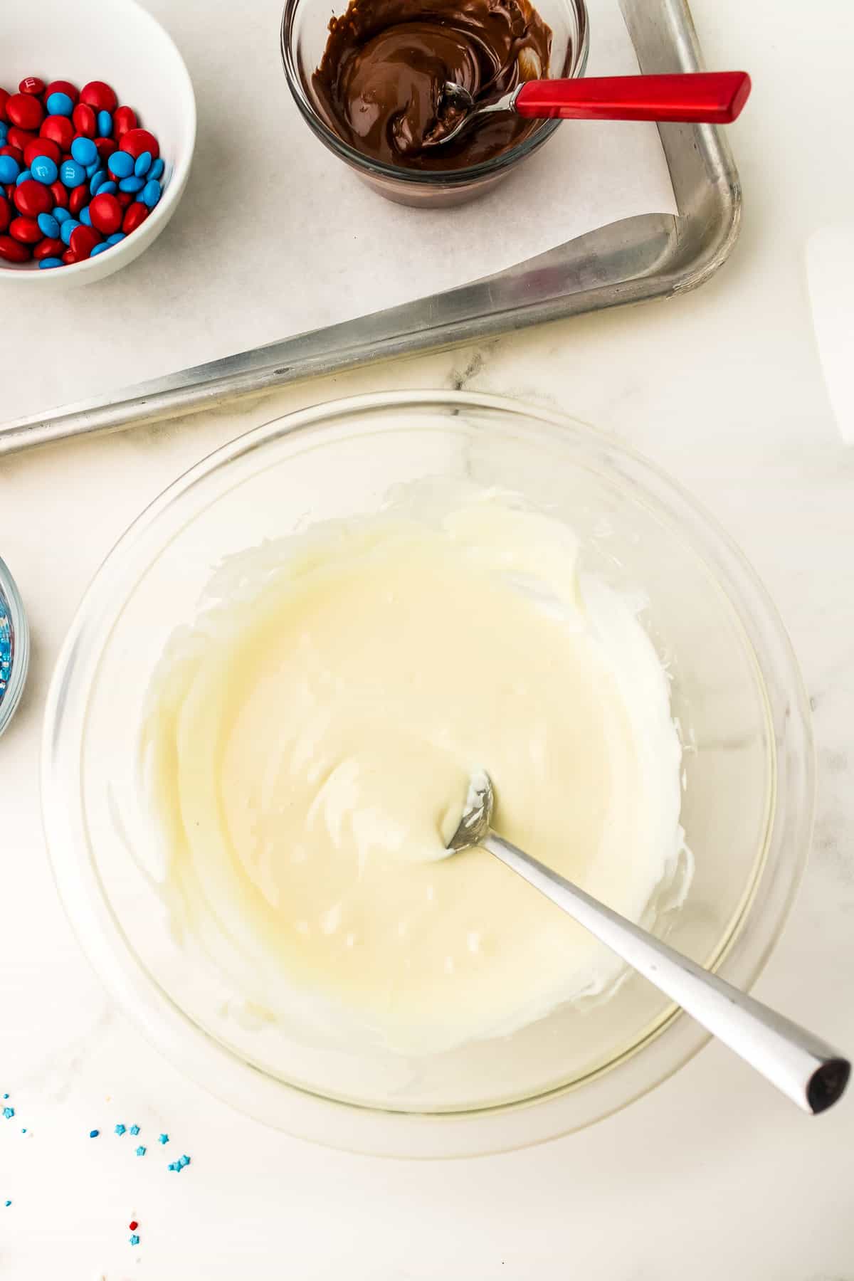 Melt White Chocolate Chips or Candies in a bowl.