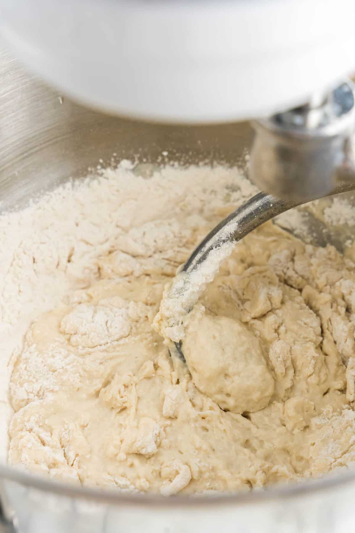 Mixing Easy Homemade Pizza Dough with a stand mixer using a dough hook