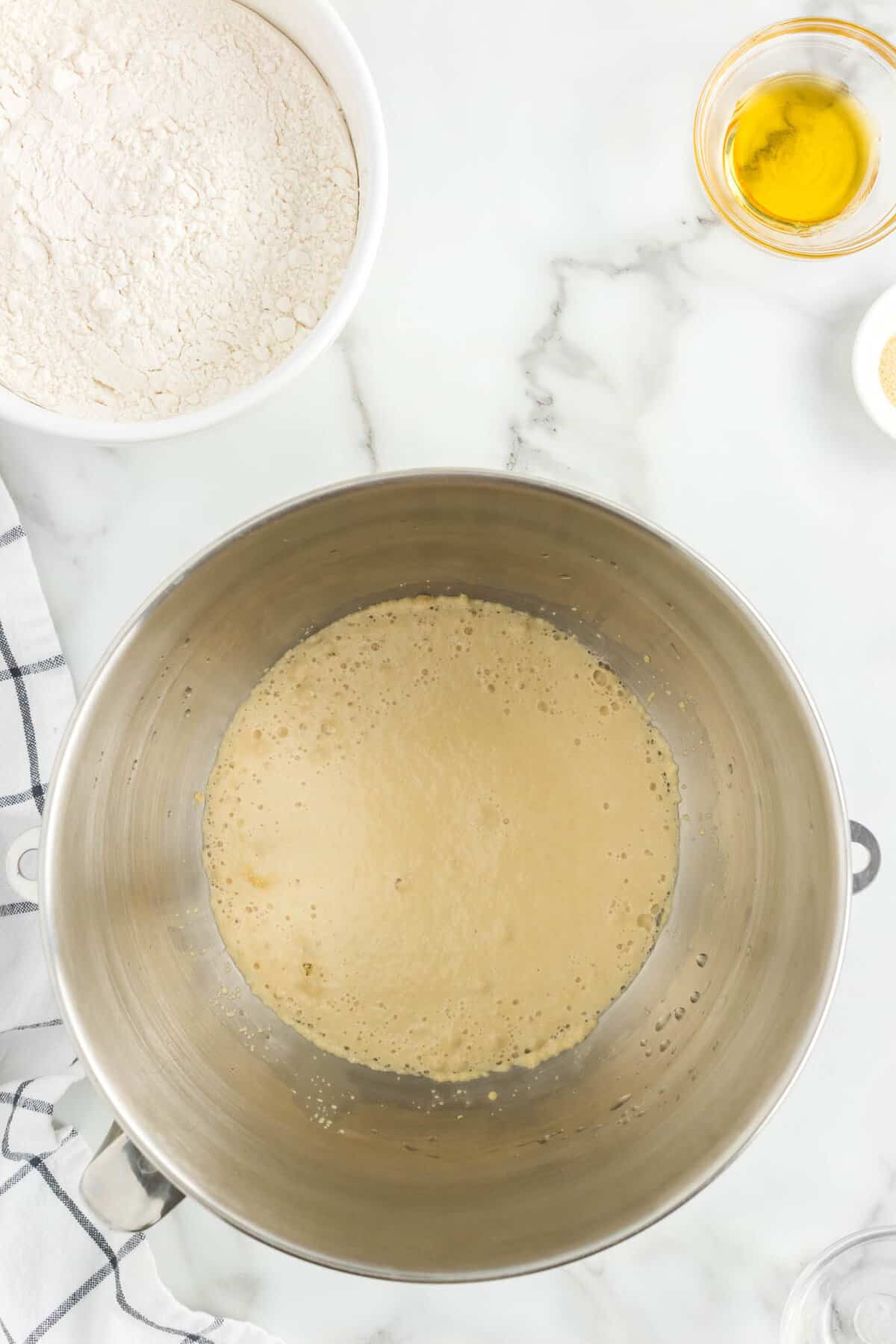 Allowing yeast mixture to proof for Homemade Pizza Dough recipe