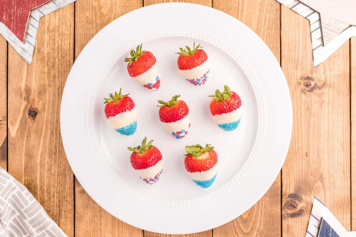 Strawberries displayed on a white plate