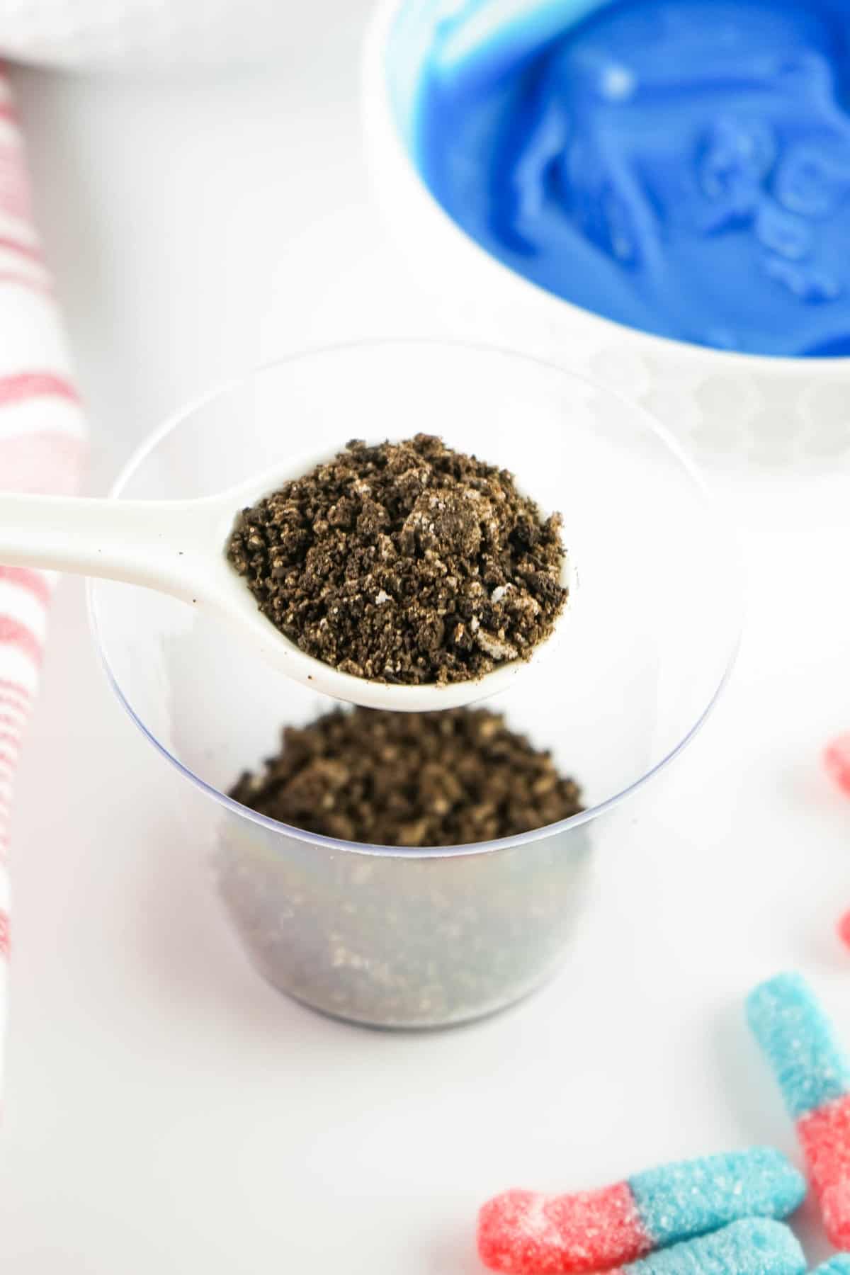 Crush up Oreos and put 1 tbsp in the bottom of a Dessert Cup.