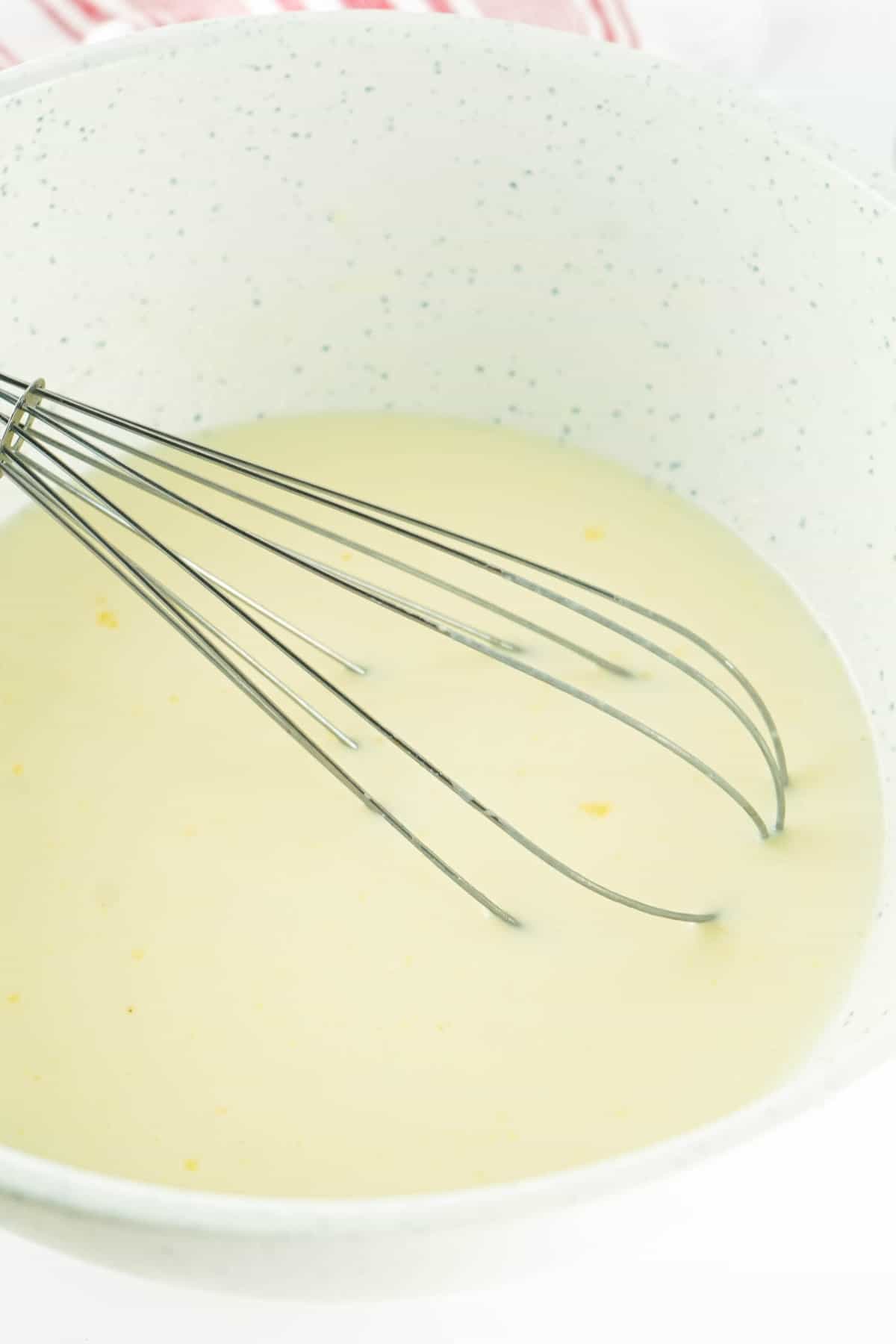 Whisk the milk and Cheesecake Pudding together in the Bowl.