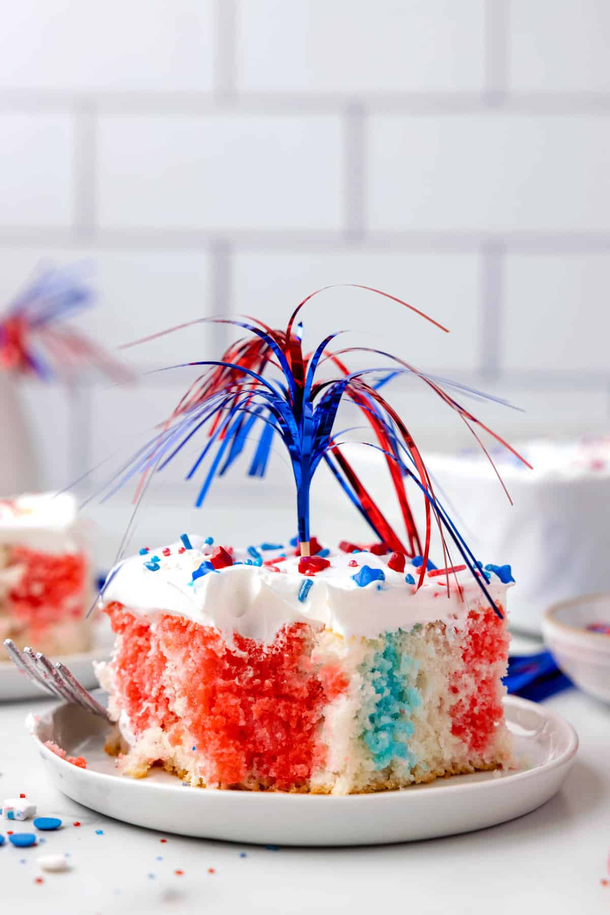 Red White and Blue Jello Cake on Plate with 4th of July Streamers