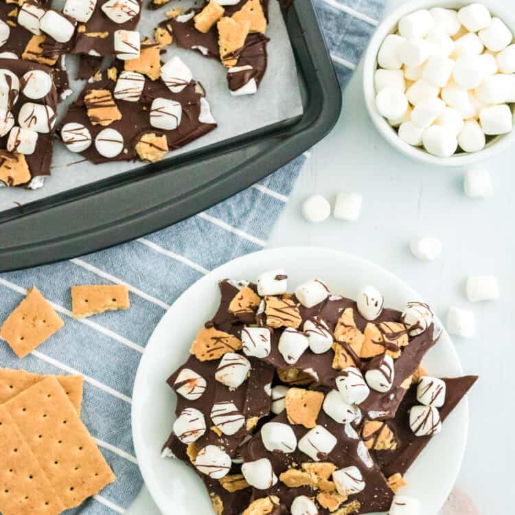 Broken S'more bark displayed on a plate