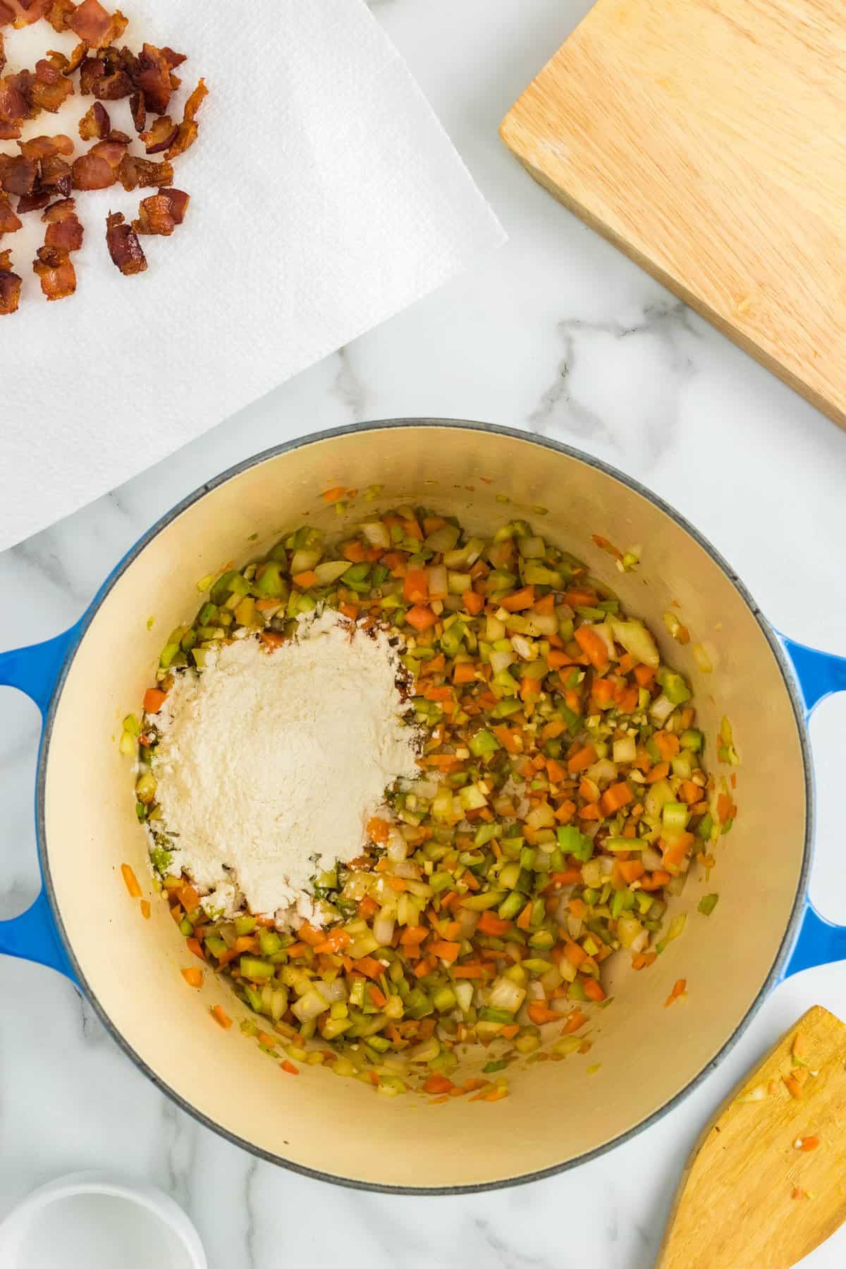 Adding Ingredients to Corn and Potato Chowder Recipe