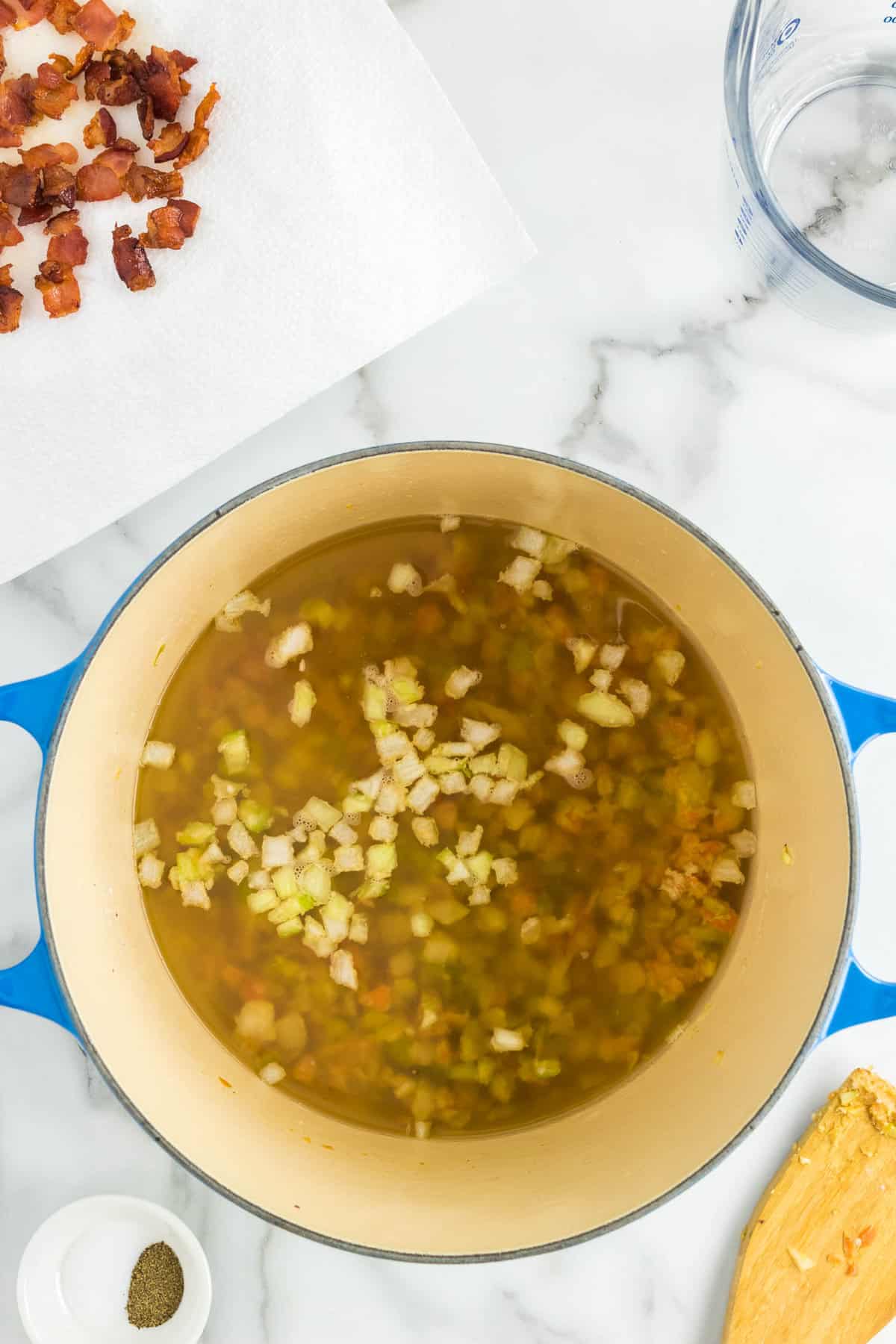 Adding Ingredients to Stock Pot for Corn and Potato Chowder Recipe