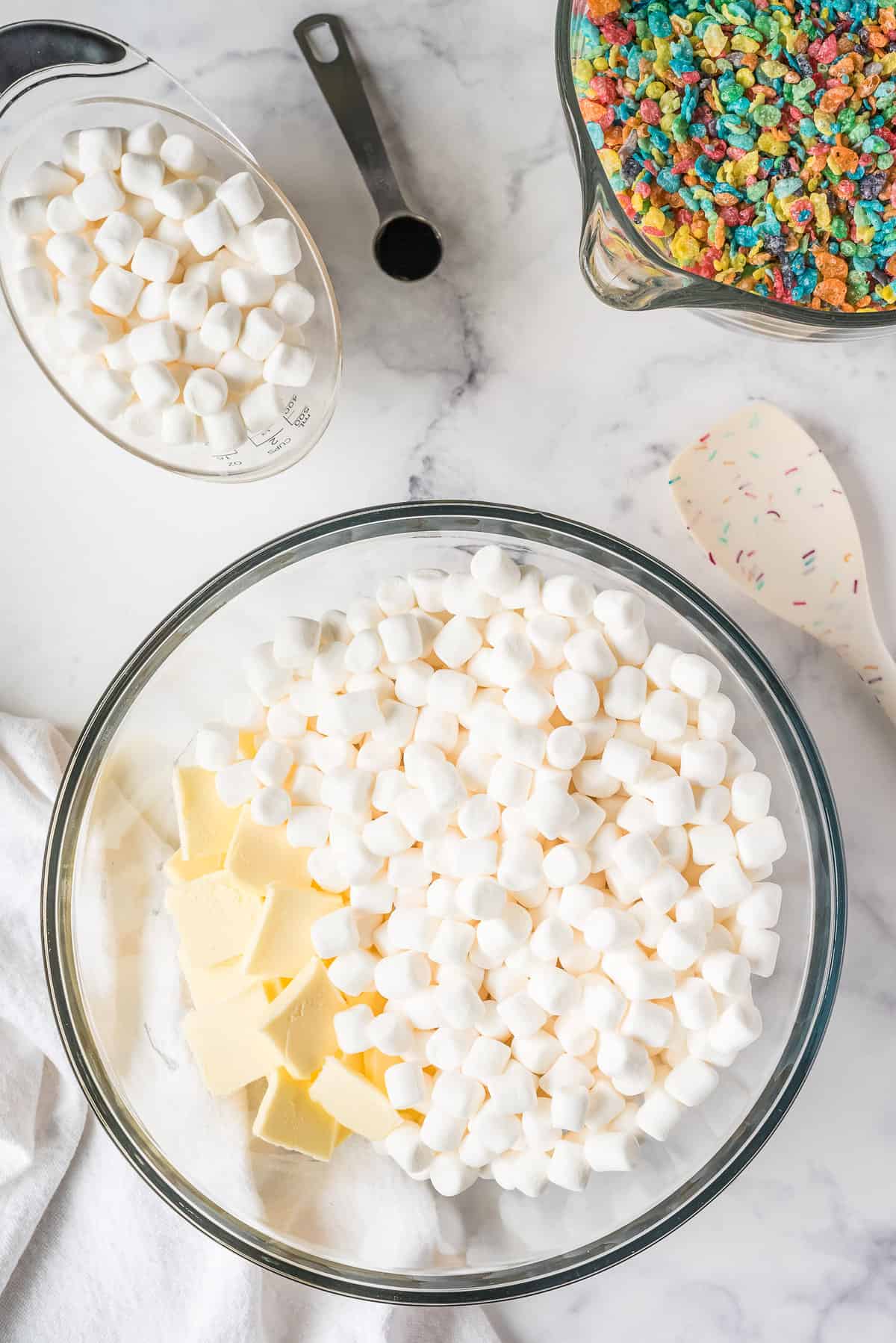 Slice the Butter in to smaller pieces & add marshmallows, then microwave.