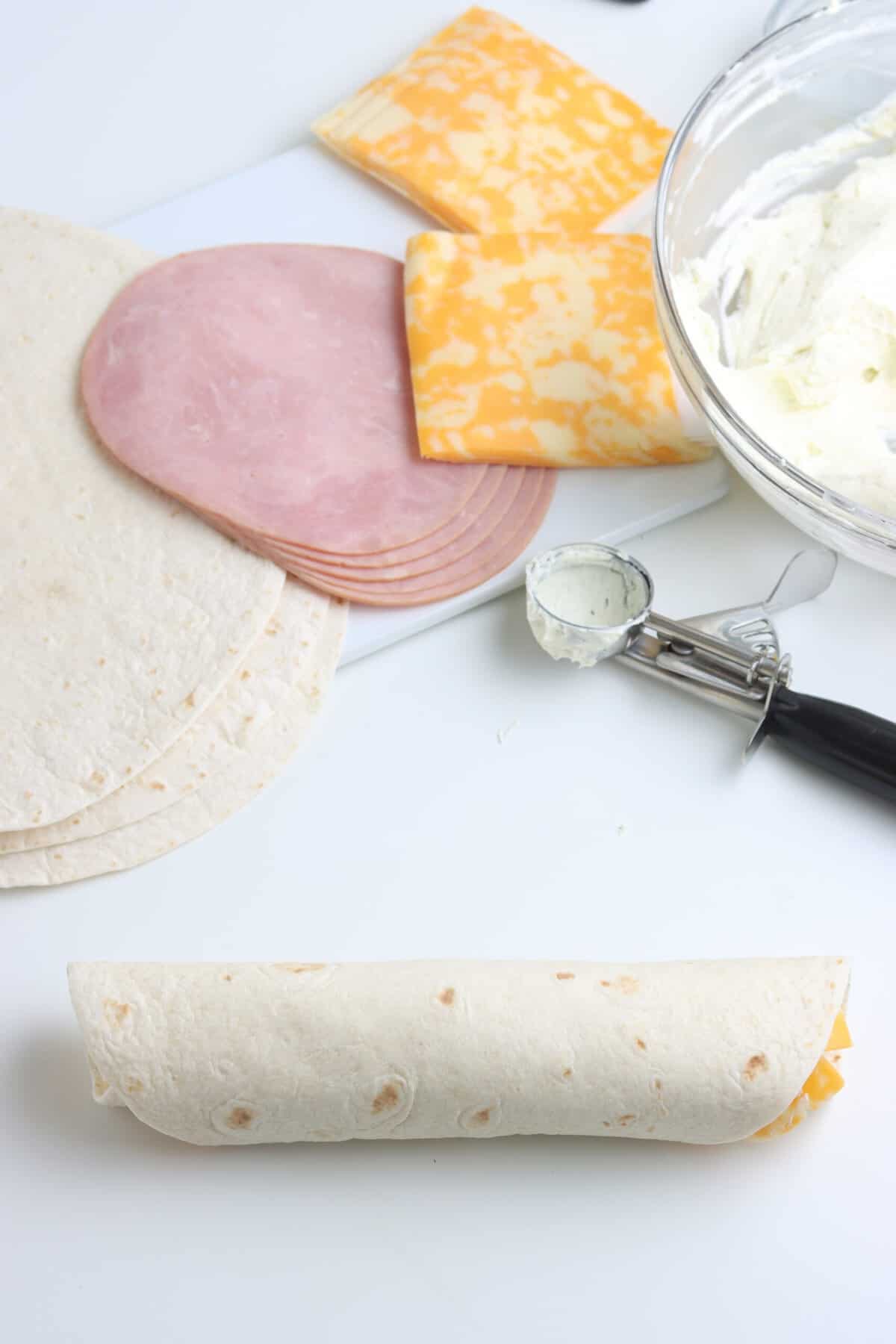 Roll up the Tortilla with Everything inside.
