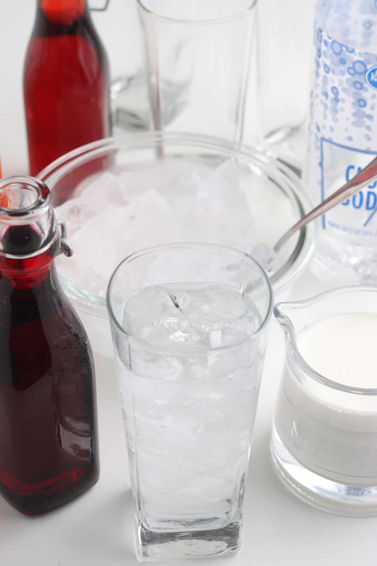 Add 1/2 - 3/4 cup of Club Soda to the Glass of Ice.