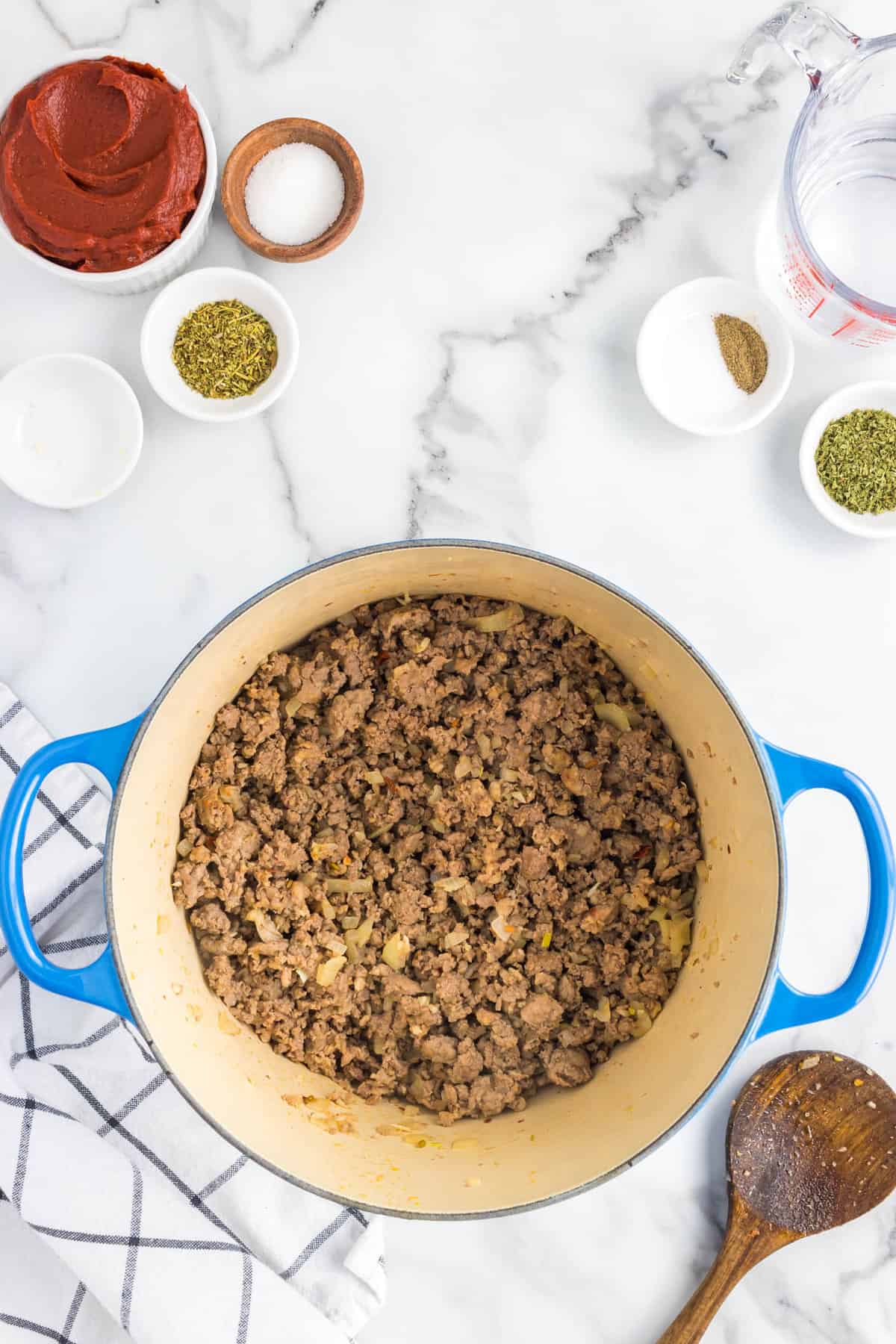 Browned and combined meats in stovetop pot for Homemade Marinara Sauce