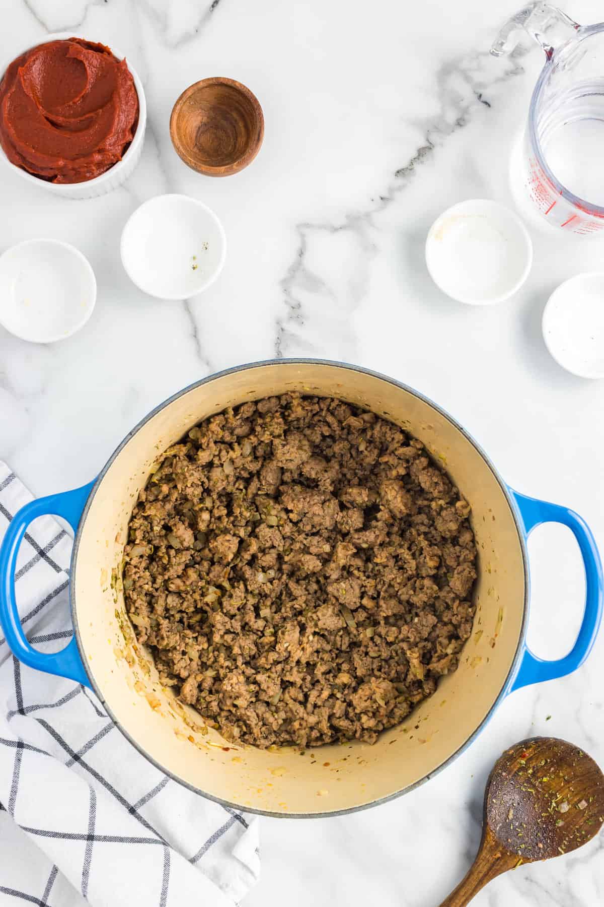 Combined meat and seasoning for Homemade Pasta Sauce in stovetop pot